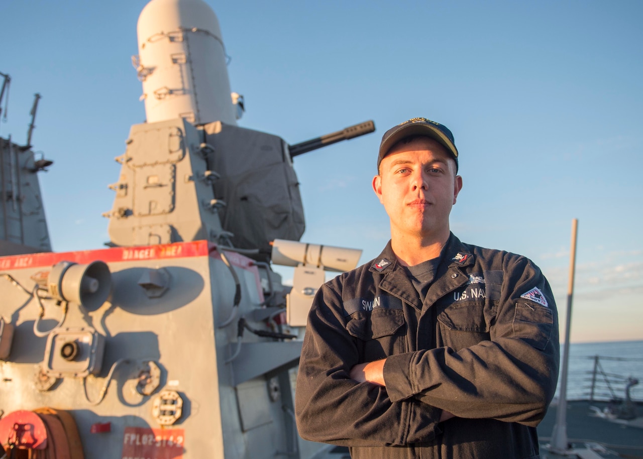 Navy Petty Officer 3rd Class Tyler Swain, a fire controlman deployed aboard the guided missile destroyer USS Bulkeley, recently pulled a man from a wrecked vehicle following a high-speed collision in Norfolk, Va., Nov. 15, 2015. U.S. Navy photo by Petty Officer 3rd Class M. J. Lieberknecht