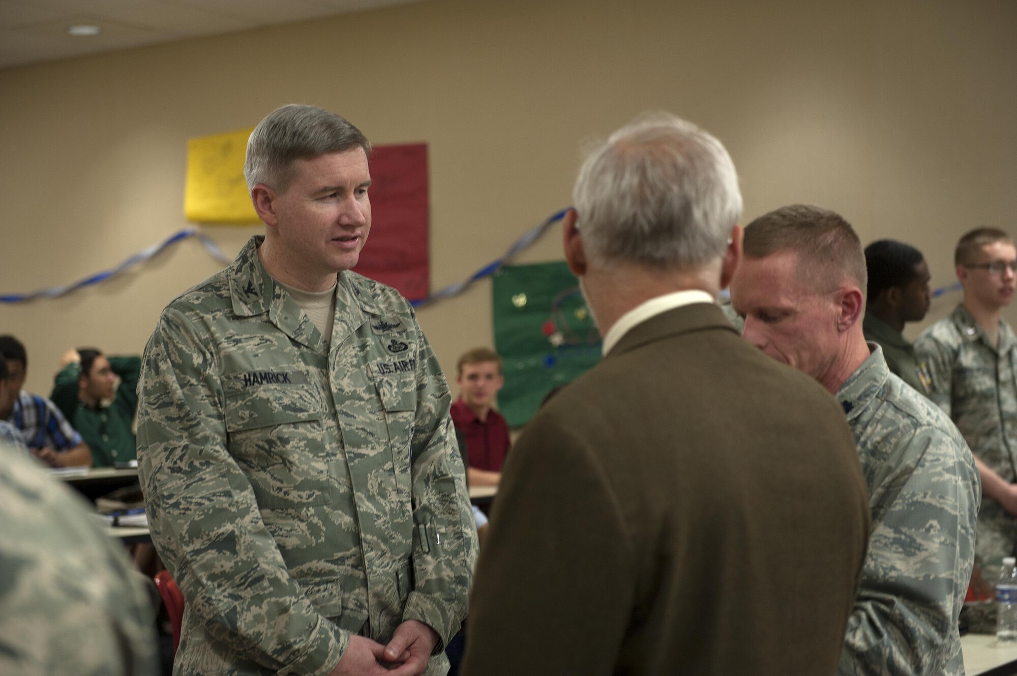U.S. Air Force Col. Terry J. Hamrick Jr., 17th Training Wing Vice Commander, speaks to Angelo State University employees during the Air Force ROTC Ceremony at Angelo State University, San Angelo, Texas, Nov. 18, 2015. Goodfellow Air Force Base and Angelo State University maintain a close relationship with various events each year, such as drill competitions and graduation ceremonies. (U.S. Air Force photo by Airman 1st Class Caelynn Ferguson/Released)