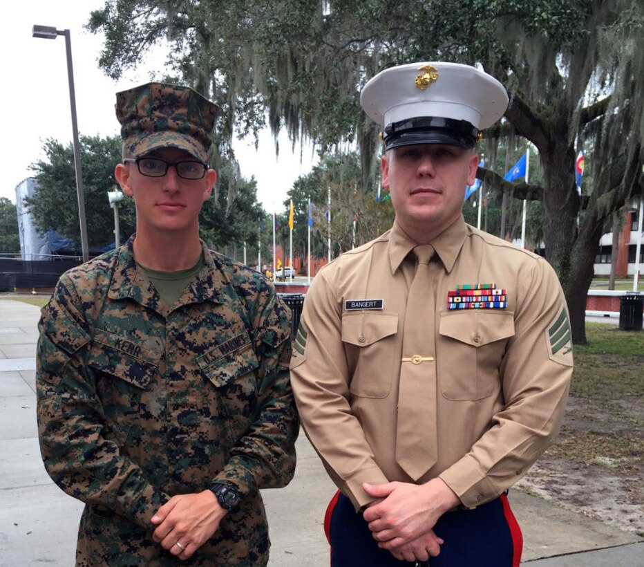 Pfc. Michael Kerr, left, stands with his recruiter, Sgt. Christopher Bangert, during a family day at Marine Corps Recruit Depot Parris Island, Nov. 19. Kerr, a Lynchburg native, graduated as the Hotel Company honor man, meaning he was the top recruit to graduate from the company. Kerr, 23, will be a trumpet player for the Marine Corps Band. (Courtesy Photo)