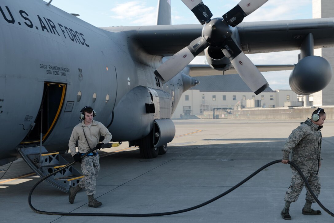 Maintainers remove a fuel hose from a C-130 Hercules during last summer's Red Flag-Alaska exercise at Defense Fuel Support Point Anchorage, a commercial fuel-support point under contract through DLA Energy.