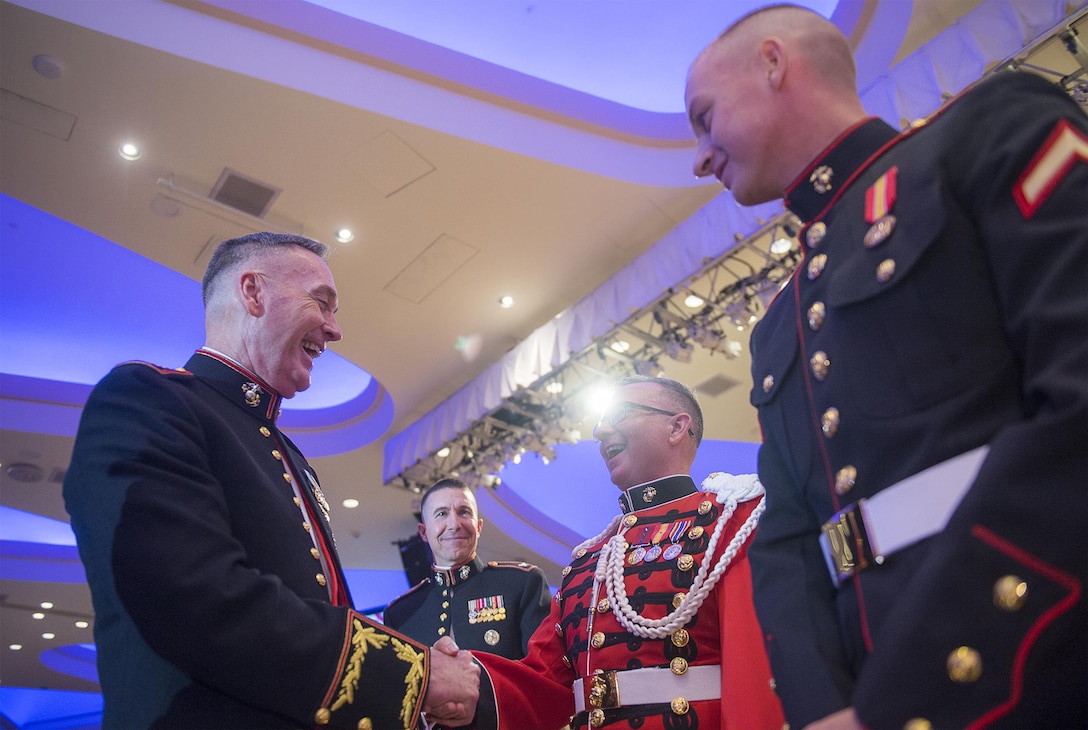 Marine Corps Gen. Joseph F. Dunford Jr., chairman of the Joint Chiefs of Staff, speaks with the oldest and youngest Marines present at the 240th Marine Corps birthday celebration in Washington, D.C., Nov. 21, 2015. DoD photo by Petty Officer 2nd Class Dominique A. Pineiro