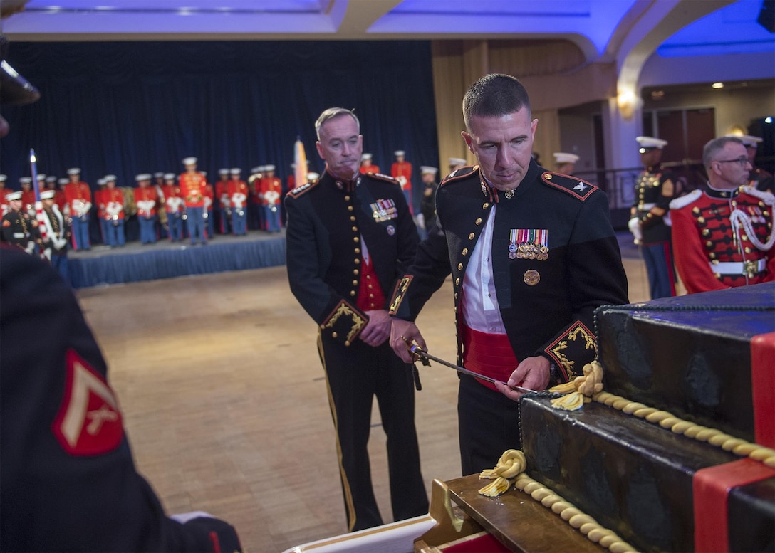 Col. Benjamin T. Watson, commanding officer, Marine Barracks Washington, cuts a cake at the 240th Marine Corps birthday celebration in Washington, D.C., Nov. 21, 2015. Marine Corps Gen. Joseph F. Dunford Jr.,  chairman of the Joint Chiefs of Staff, served as the event's guest of honor and keynote speaker.  DoD photo by Petty Officer 2nd Class Dominique A. Pineiro