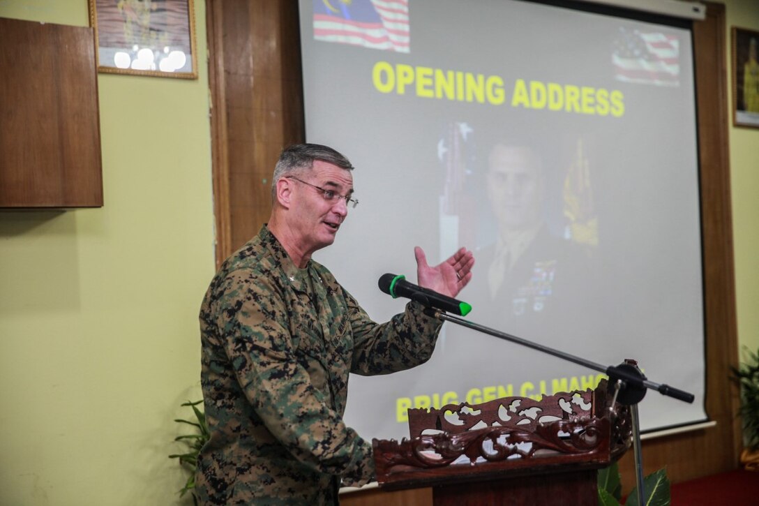 TANDUO, Malaysia (Nov. 10,2015) U.S. Marine Brig. Gen. Christopher J. Mahoney speaks about the important role U.S. and Malaysian armed forces play in maintaining theater security in the Pacific during the opening ceremony for Malaysia-United States Amphibious Exercise 2015. Mahoney is the deputy commander of Marine Forces Pacific. During MALUS AMPHEX 15, Marines with the 15th Marine Expeditionary Unit worked with Malaysian armed forces sharing jungle survival skills, jungle warfare tactics, and amphibious operations. The purpose of the exercise was to strengthen military cooperation in the planning and execution of amphibious operations between Malaysian armed forces and U.S. Marines. The 15th MEU is currently deployed in the Indo-Asia-Pacific region to promote regional stability and security in the U.S. 7th Fleet area of operations. (U.S. Marine Corps photo by Sgt. Emmanuel Ramos/Released)