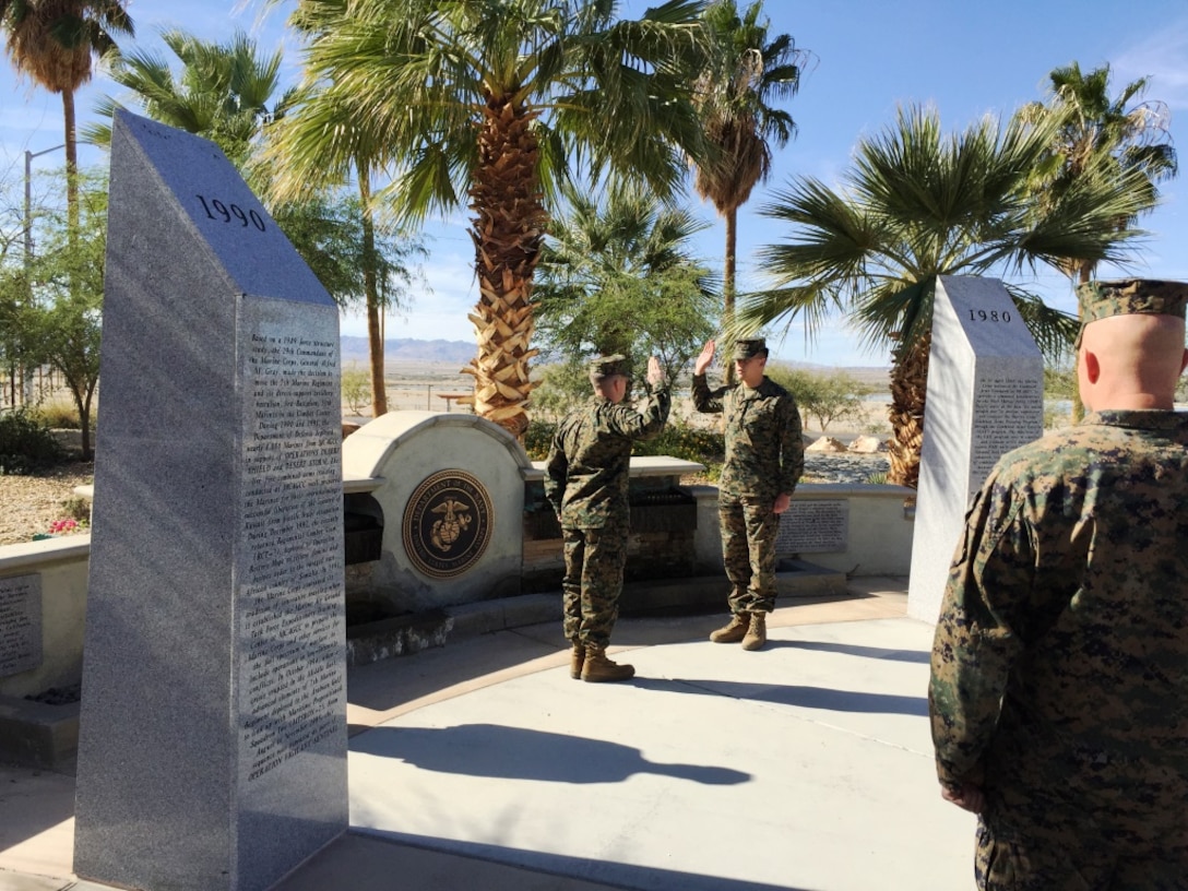 Capt David J. Leonard Jr. administers the Oath of Enlistment to Cpl Robinson during a ceremony at Heritage Park on November 12th, 2015.  Cpl Robison re-enlisted for four more years in the Military Occupational Specialty of 2821, Technical Controller Marine.  Cpl Robison is currently assigned as the Marines Awaiting Training Chief Instructor for Alpha Company.