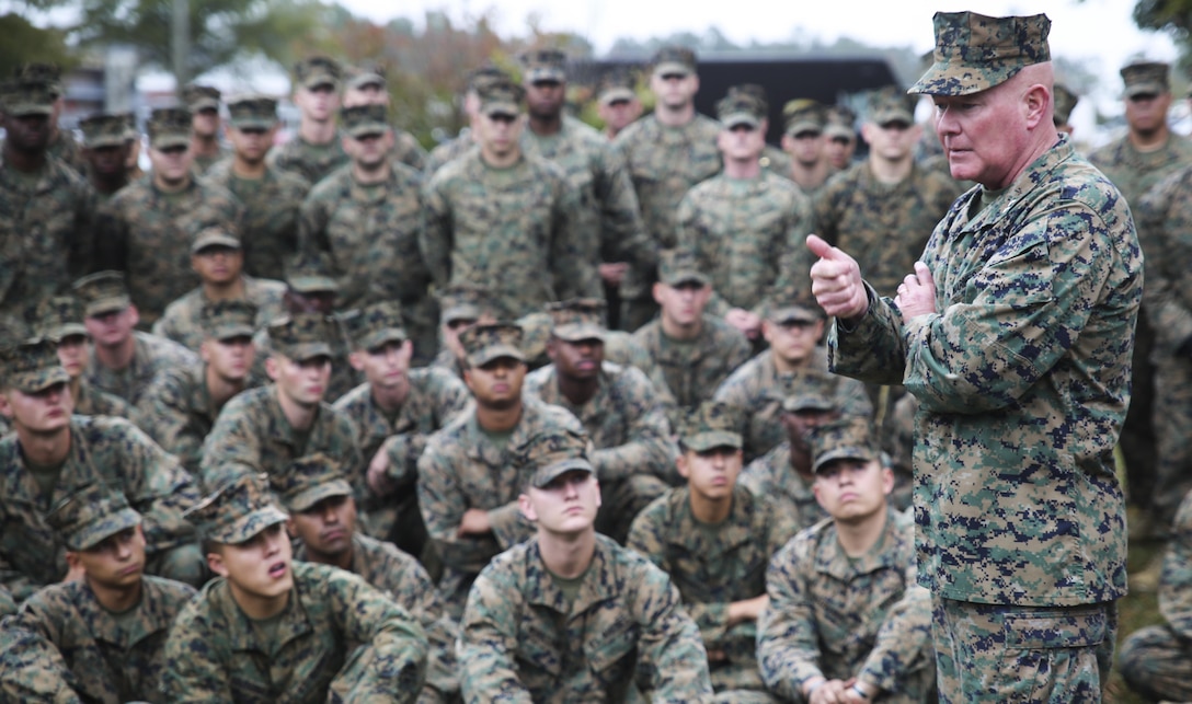 Maj. Gen. W. Lee Miller, commanding general of II Marine Expeditionary Force, recognizes Marines with 2nd Combat Engineer Battalion for their distinguished performance in preparation for contingency response operations, Nov. 18, 2015, at Camp Lejeune, N.C. The Marines earned recognition for their ability to execute heavy equipment support missions and for their overall readiness to support II MEF operations.  II MEF forces support the U.S. Geographic Combatant Commands with scalable Marine Air Ground Task Force support and execute missions across the range of military operations, which ranges from theater security cooperation with international partners to corps-level operations in support of contingency response.