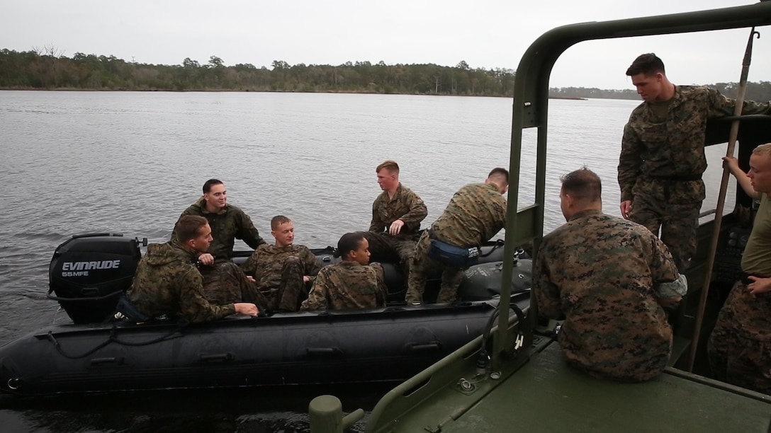 Marines with 8th Engineer Support Battalion, Improved Ribbon Bridge Platoon check in with the safety boat while taking part in a Zodiac operator’s course aboard Camp Lejeune, N.C., Nov. 19, 2015. This course was a brief instruction on maintaining, handling and basic maneuverability and safety with the Zodiac. (U.S. Marine Corps Video illustration by Lance Cpl. Preston McDonald/Released)