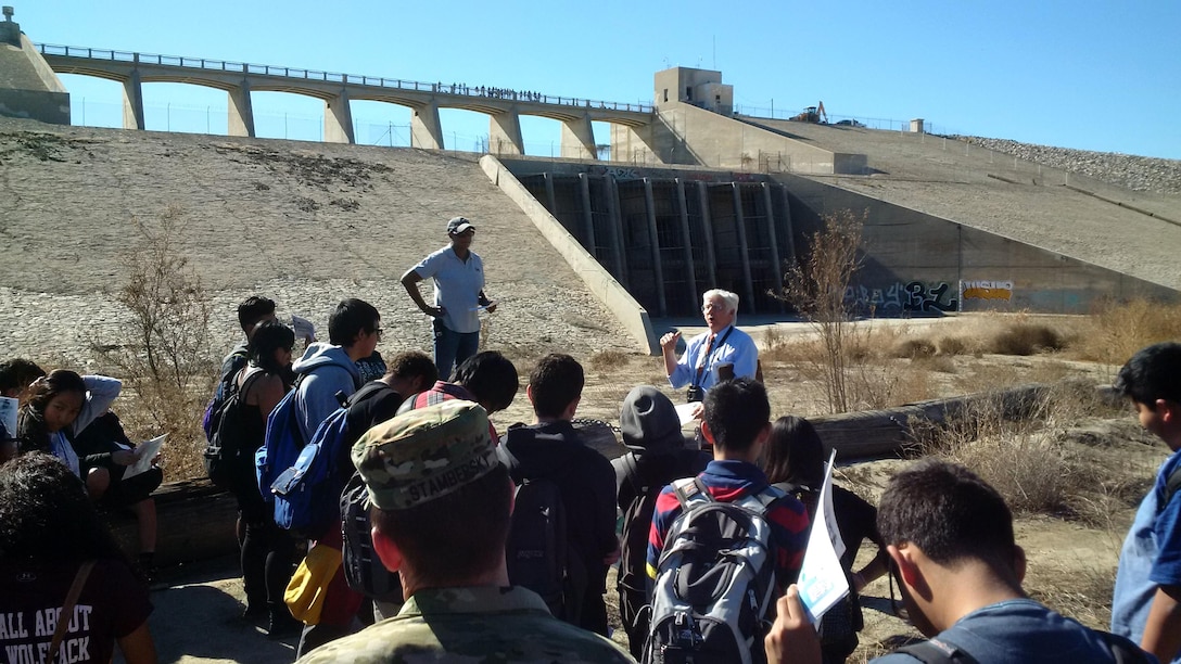 Ecologist Carvel Bass educates area high school students about wildlife and vegetation in the basin of Hansen Dam, a U.S. Army Corps of Engineers Los Angeles District flood risk reduction project located in the San Fernando Valley, during a tour of the facility Nov. 19.