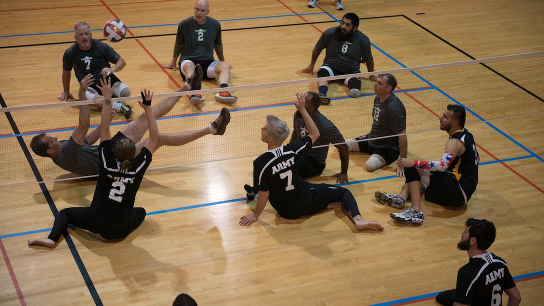 Service members come together Nov. 19, 2015, to participate in a joint service event as part of Warrior Care Month. Warrior Care Month was created on Nov. 2, 2010 as a way to help wounded, ill or injured service members recover. This month, service members got the chance to compete in two different joint service events, the first being wheelchair rugby and the second being sitting volleyball.