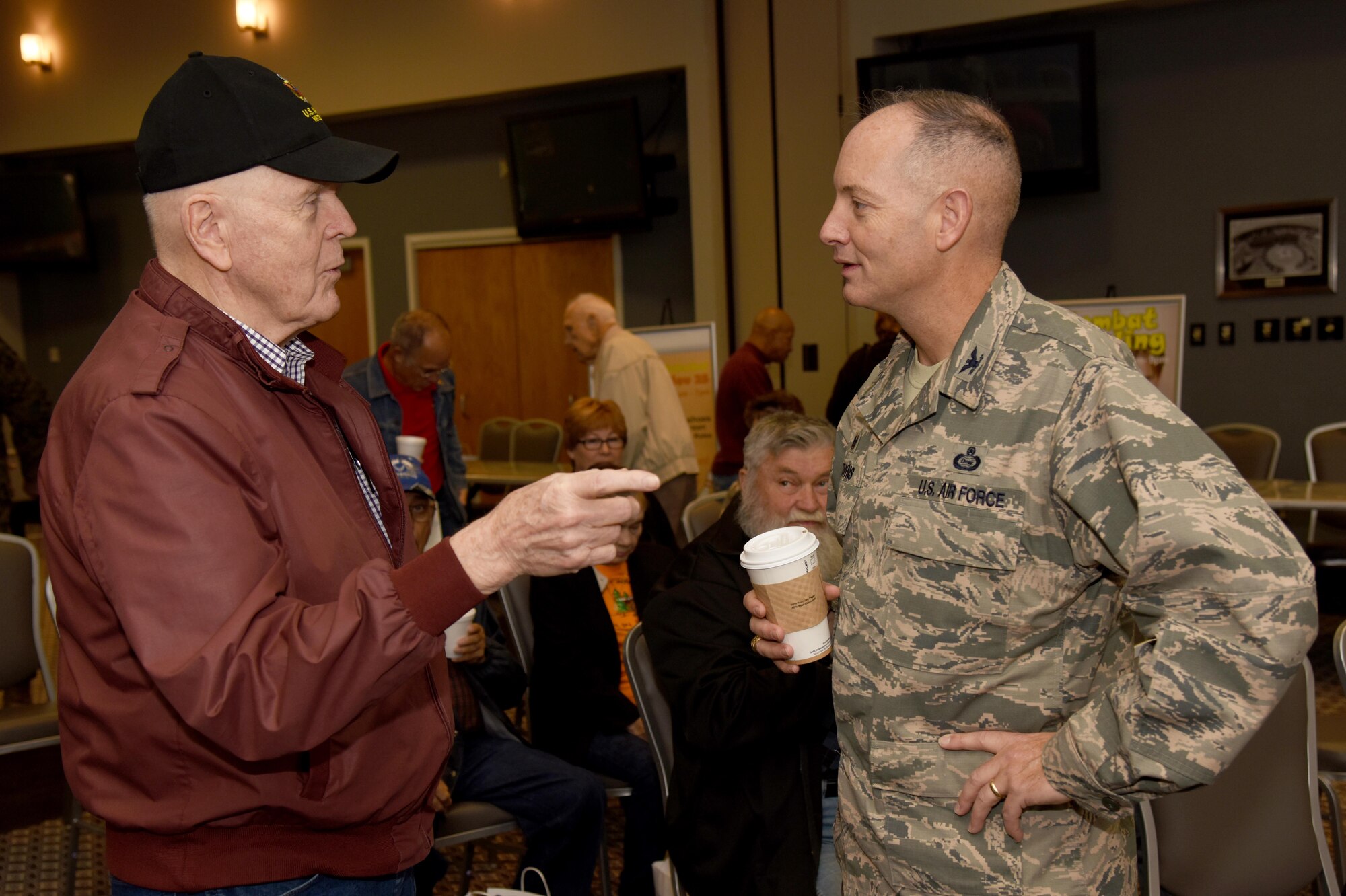 Retirees speak with the Goodfellow Veterinarian Clinic personnel at the Retiree Appreciation Day in the Event Center on Goodfellow Air Force Base, Texas, Nov. 19, 2015. Several base organizations set up booths at the event to talk to retirees about the services they provide. (U.S. Air Force photo by Senior Airman Joshua Edwards/Released)