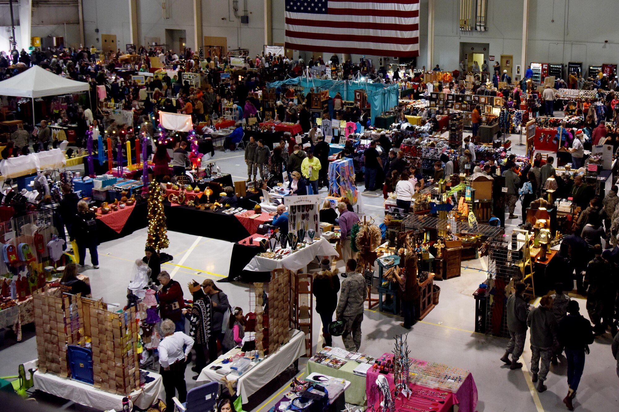San Angelo vendors set up displays for their products to sell to both civilians and military during the 7th Annual Goodfellow Community Appreciation Day at the Louis F. Garland Department of Defense Fire Academy on Goodfellow Air Force Base, Texas, Nov. 21, 2015. Community Appreciation Day is an annual event, where the base is open to the public to create a unified environment for both Goodfellow and the local community. (U.S. Air Force photo by Senior Airman Joshua Edwards/Released)