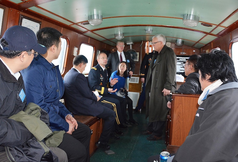 Inside the cabin onboard the USACE vessel Hocking, Brig. Gen. William Graham, CG USACE North Atlantic Division and Mr. Steve Stockton, HQ USACE Director of Civil Works discuss post Sandy coastal projects with Minister Chen Lei of the Ministry of Water Resources of China and Delegation and Ms. Jing Xu, Deputy Division Chief, Department of International Cooperation, Science and Technology. On November 19, 2015 the USACE leaders conducted briefings with the Chinese Minister of Water Resources in New York City regarding post Sandy efforts.  