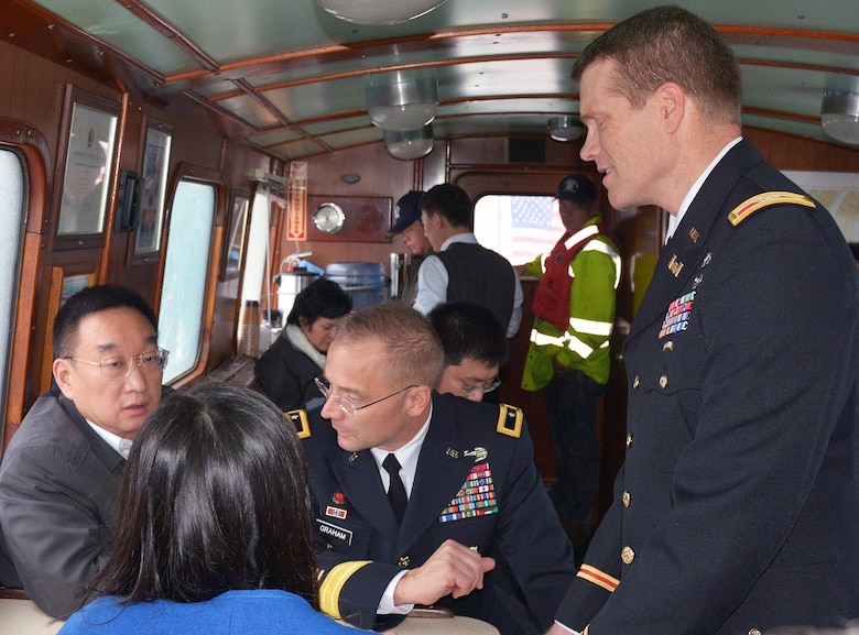 (l-r) Minister Chen Lei, Ministry of Water Resources of the People's Republic of China and Ms. Jing Xu, Deputy Division Chief, Department of International Cooperation, Science and Technology discuss post Sandy coastal projects with Brig. Gen. William Graham, CG USACE North Atlantic Division and Col. David Caldwell, Cmdr. USACE New York District. 