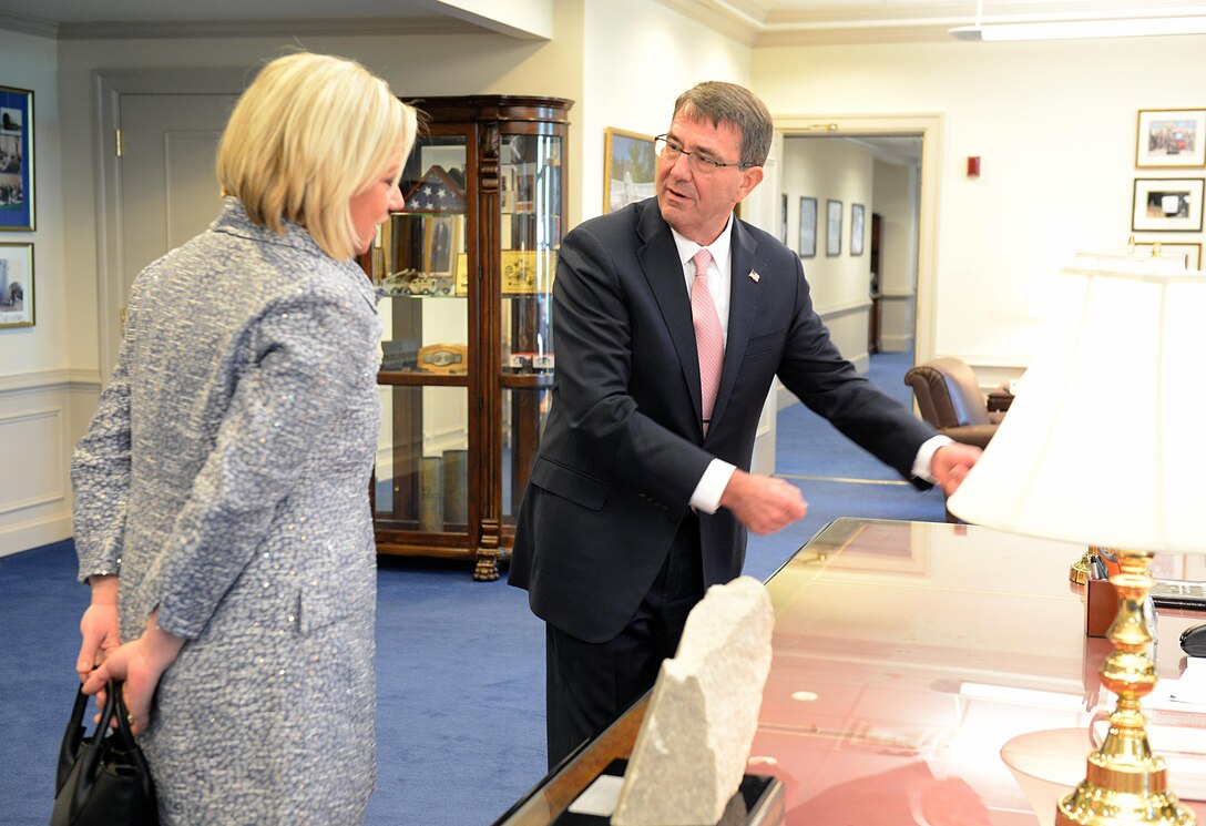 U.S. Defense Secretary Ash Carter tells Dutch Minister Defense Jeanine Hennis-Plasschaert some history about his desk at the Pentagon, Nov. 23, 2015. DoD photo by Army Sgt. 1st Class Clydell Kinchen
