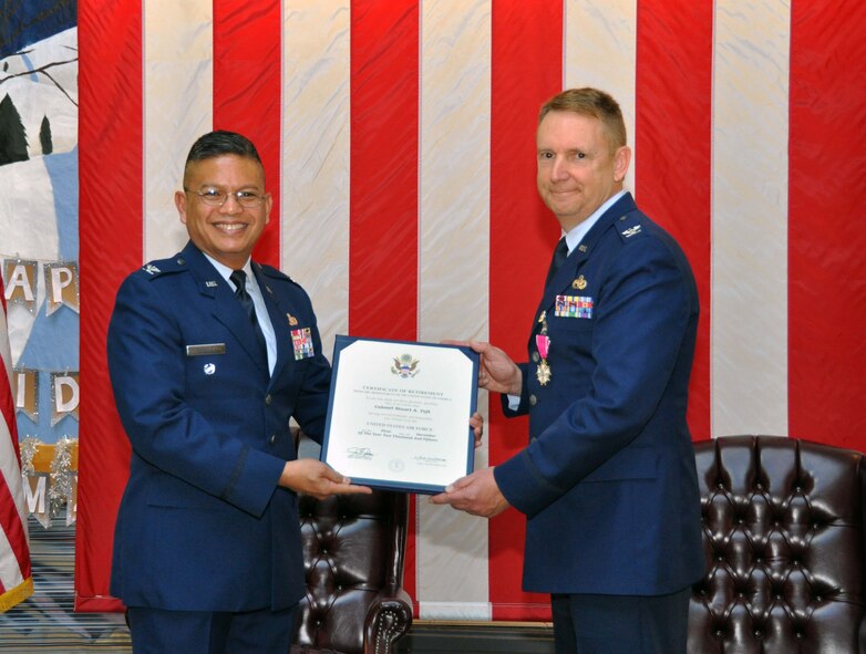 TRAVIS AIR FORCE BASE, Calif. -- Col. Stuart A. Toft, 349th Mission Support Group commander, retired after 30 years of service, November 22, 2015. During the ceremony, Toft was also awarded the Legion of Merit for extraordinary service during his tenure.  (U.S. Air Force photo/Staff Sgt. Cindy G. Alejandrez)
