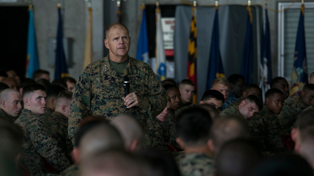 The 37th Commandant of the Marine Corps, Gen. Robert B. Neller, speaks to service members during a Nov. 23 visit to Marine Corps Air Station Futenma, Okinawa. The CMC and Sgt. Maj. of the Marine Corps Ronald L. Green visited service members with III Marine Expeditionary Force, the “tip of the spear,” in the Asia-Pacific region by travelling around and speaking with forward deployed Marines across the installations that comprise Marine Corps Base Camp Smedley D. Butler, Okinawa, Japan. The Marines and sailors of III MEF are faithfully committed to a force posture in the Asia-Pacific that is operationally ready and geographically dispersed, responsive to the requirements of the Japan/U.S. defense alliance.