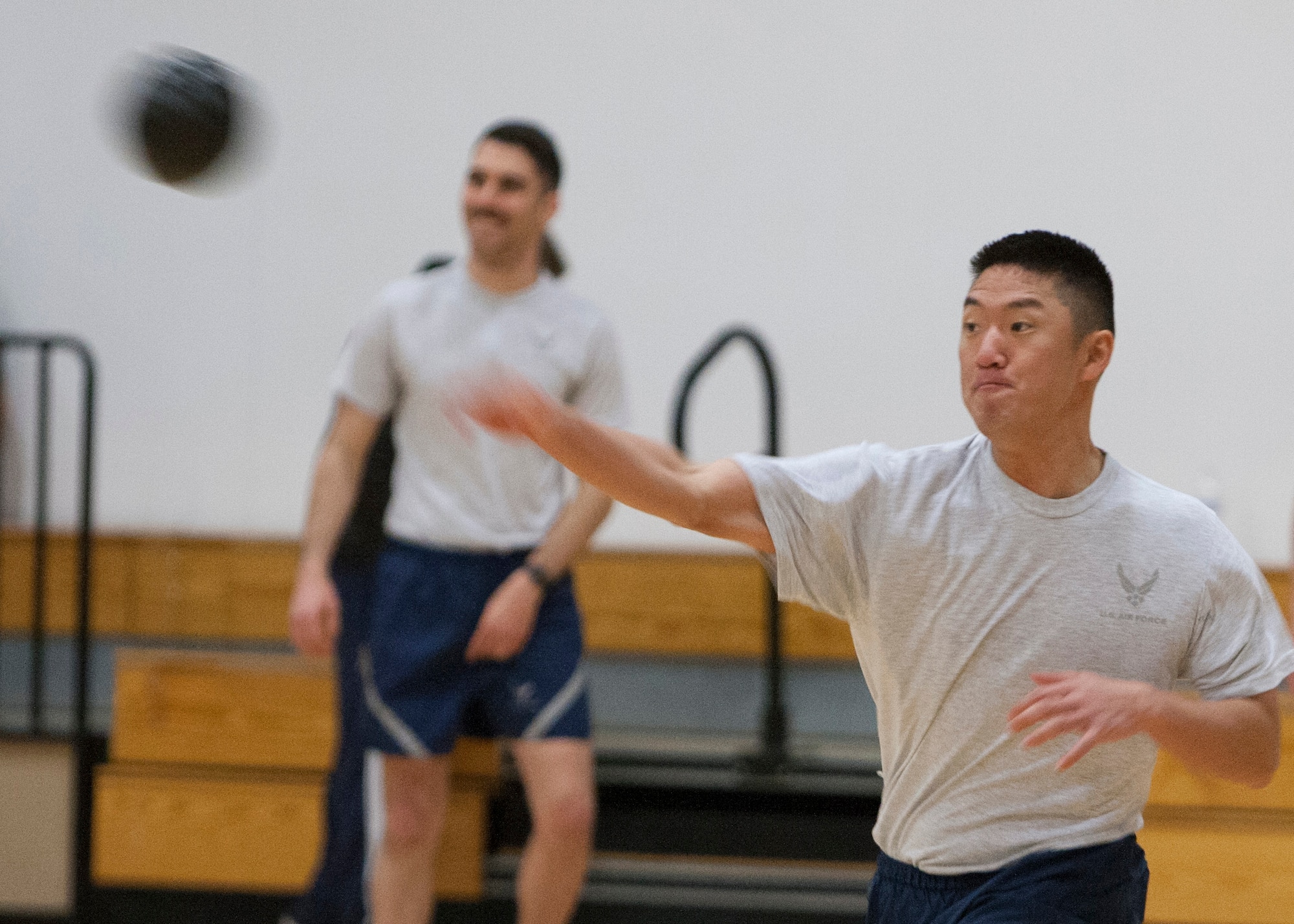 Joshiro Nagashima, throws a dodgeball during a dodgeball tournament at Freedom Hall Fitness Center on F.E. Warren Air Force Base, Wyo., Nov. 20, 2015. The tournament had the largest amount of participants for a sports event held by the fitness center this year. (U.S. Air Force photo by Lan Kim)

