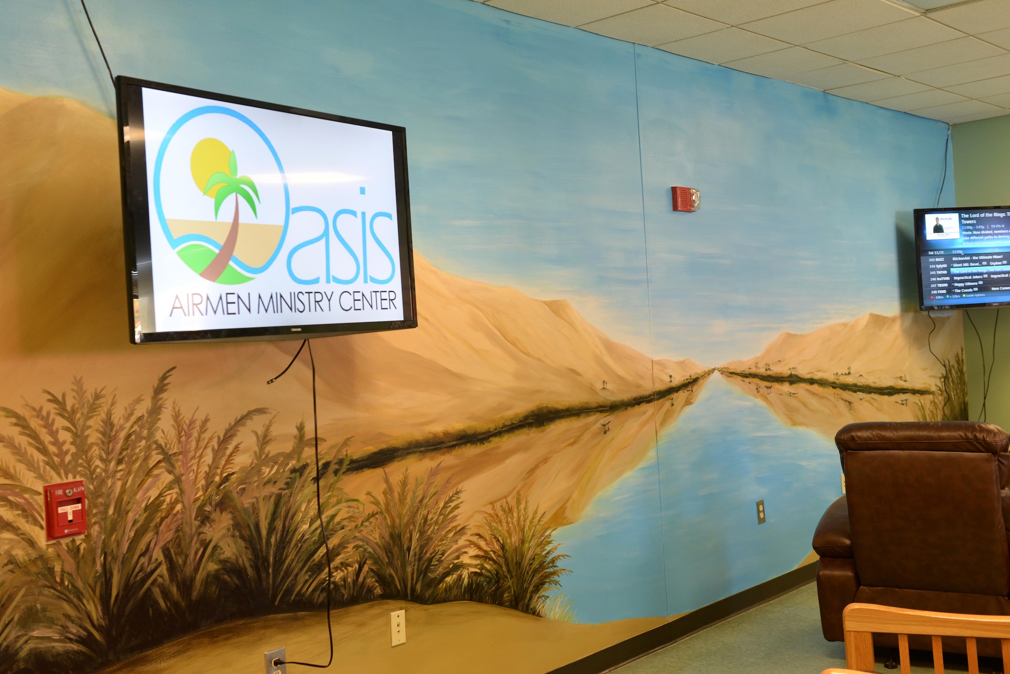 A mural, painted by Airman 1st Class Daenna Conger, 4th Fighter Wing Command Post emergency actions controller, adorns the walls of the recently renovated Oasis Airmen Ministry Center, Nov. 21, 2015, at Seymour Johnson Air Force Base, North Carolina. The Oasis recently underwent several renovations, including the addition of a theater room, karaoke room and more for Team Seymour Airmen. (U.S. Air Force photo/Airman 1st Class Ashley Williamson)