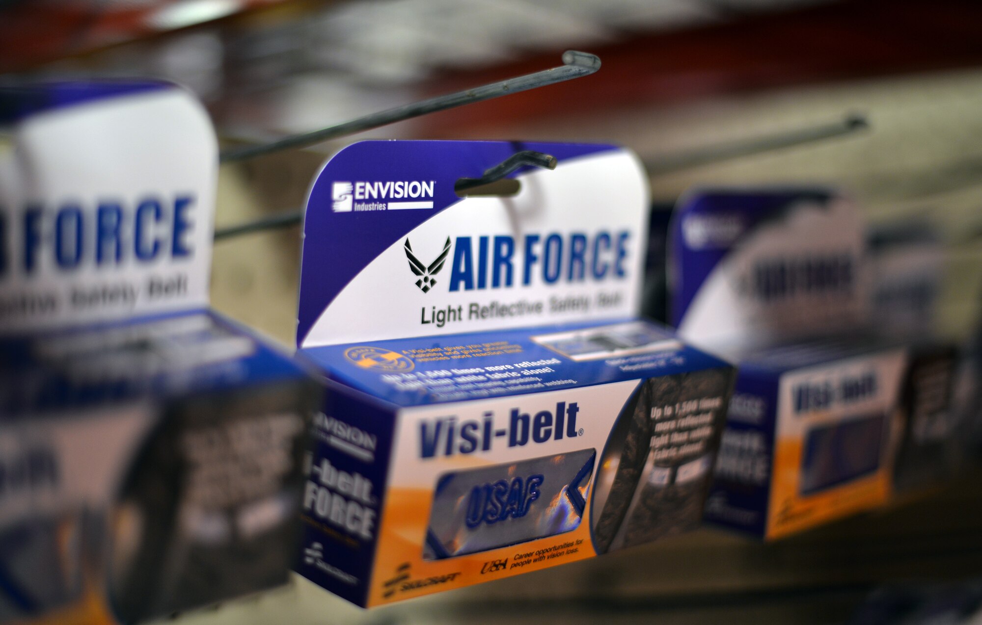 Reflective Belts hang on the shelves of the Envision Xpress store Nov. 9, 2015 on Offutt Air Force Base, Neb. The belts are among the many products made by the visually impaired. (U.S Air Force photo by Josh Plueger)
