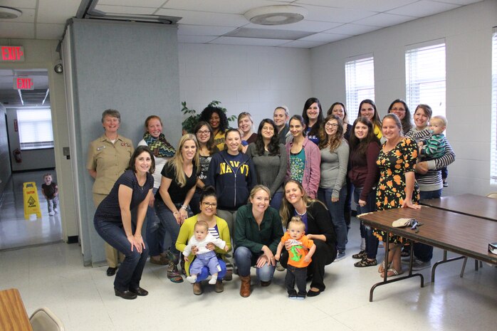 The most recent COMPASS course graduating class poses at the Reagan Center, JB Charleston – NWS on November 19, 2015. COMPASS, a team-mentoring program developed by Navy spouses for Navy spouses, is held several times throughout the year. The unique course helps spouses understand and meet the challenges of the Navy lifestyle. For more information on COMPASS call toll free 1-877-673-7773.