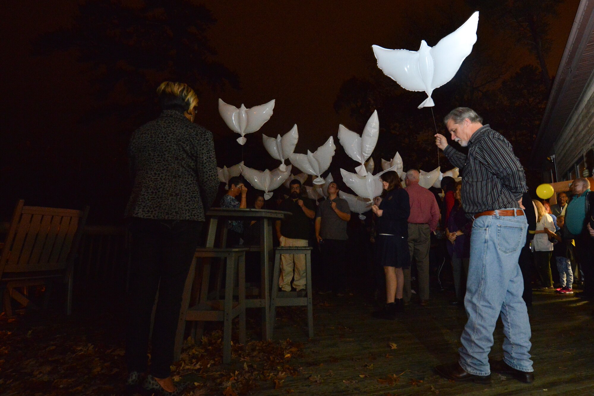 Gold Star family members release biodegradable balloons at the 5th Annual Survivor Outreach Services’ Thanks for Giving social at Fort Eustis, Va., Nov. 19, 2015. The balloons represented letting go of the pain and hardship faced when losing a loved one. (U.S. Air Force photo by Staff Sgt. Natasha Stannard)