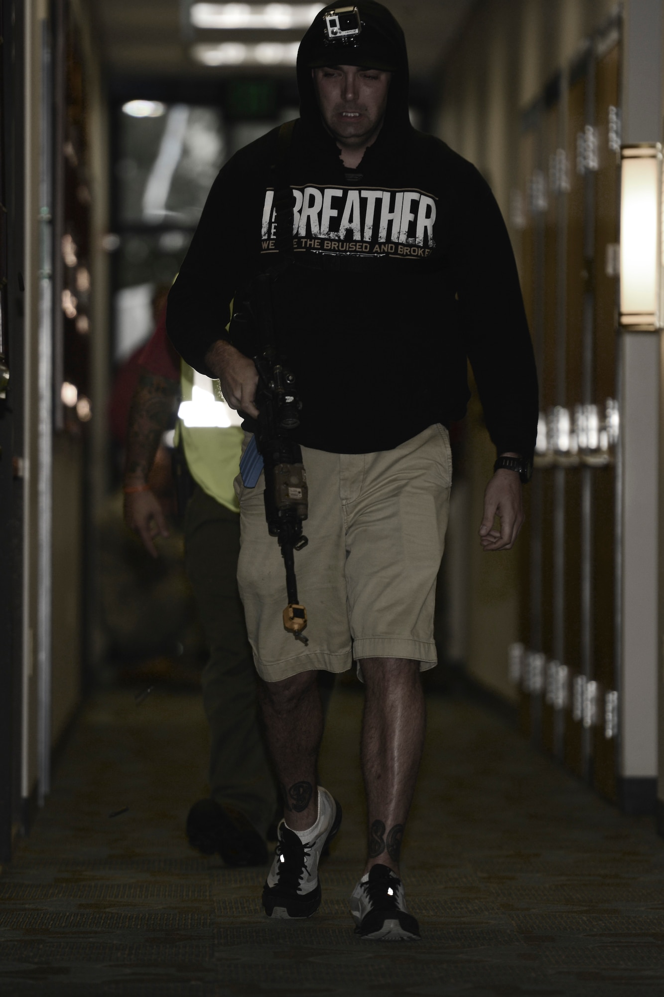 U.S. Air Force Staff Sgt. Roger Wood, a trainer with the 633rd Security Forces Squadron, acts as an active shooter at Langley Air Force Base, Va., Nov. 19, 2015. The profile of an active shooter includes an individual actively engaged or attempting to kill people in a confined and populated area, in most cases there is no pattern or method to their selection of victims. (U.S. Air Force photo illustration by Staff Sgt. Ciara Gosier)