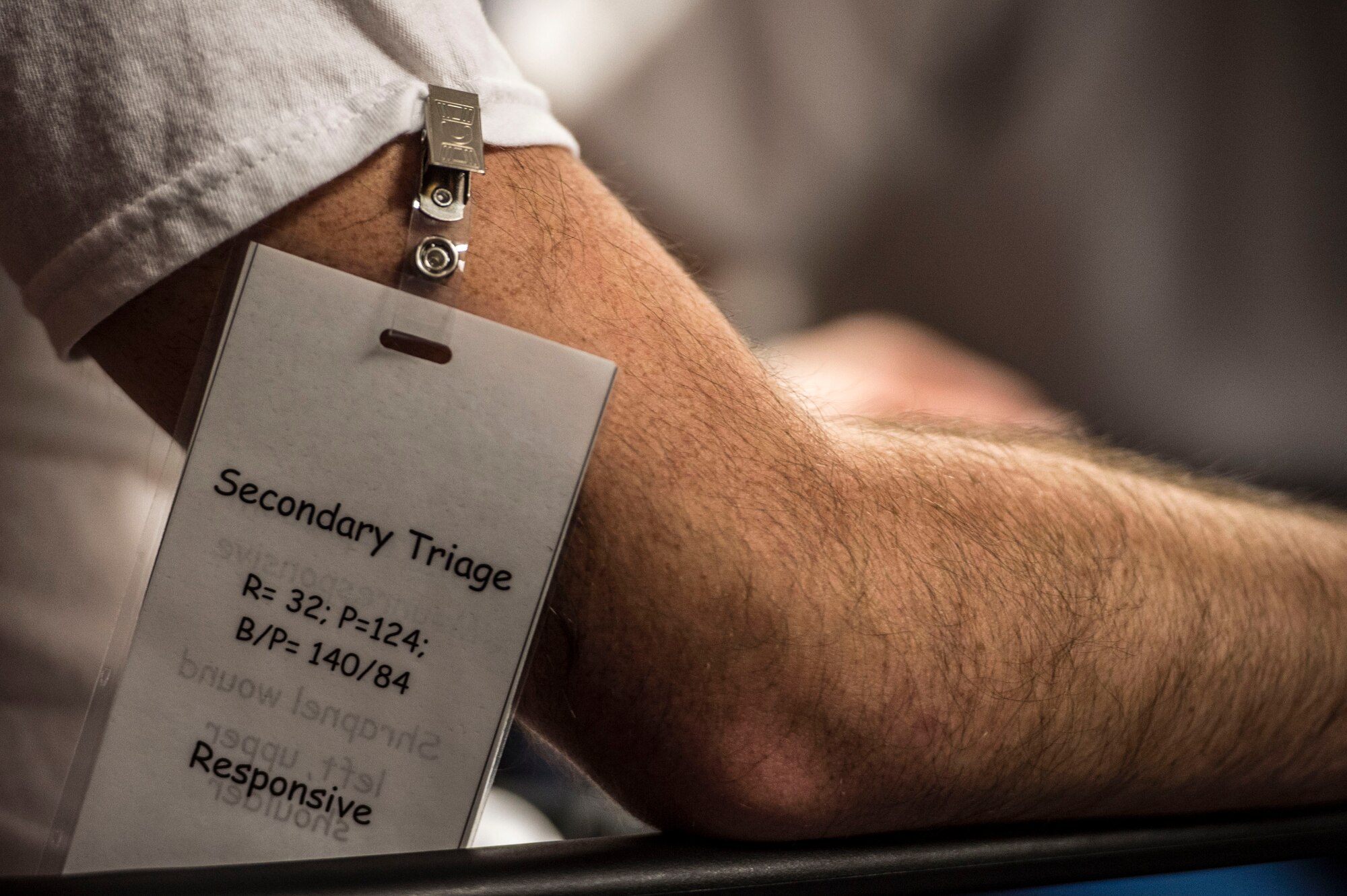 A U.S. Airman prepares to be a role player during an active shooter exercise at Langley Air Force Base, Va., Nov. 19, 2015. Role players acted as victims of a shooter and first responders were tested on their abilities to triage and treat the patients in a timely manner. (U.S. Air Force photo by Senior Airman Kayla Newman)