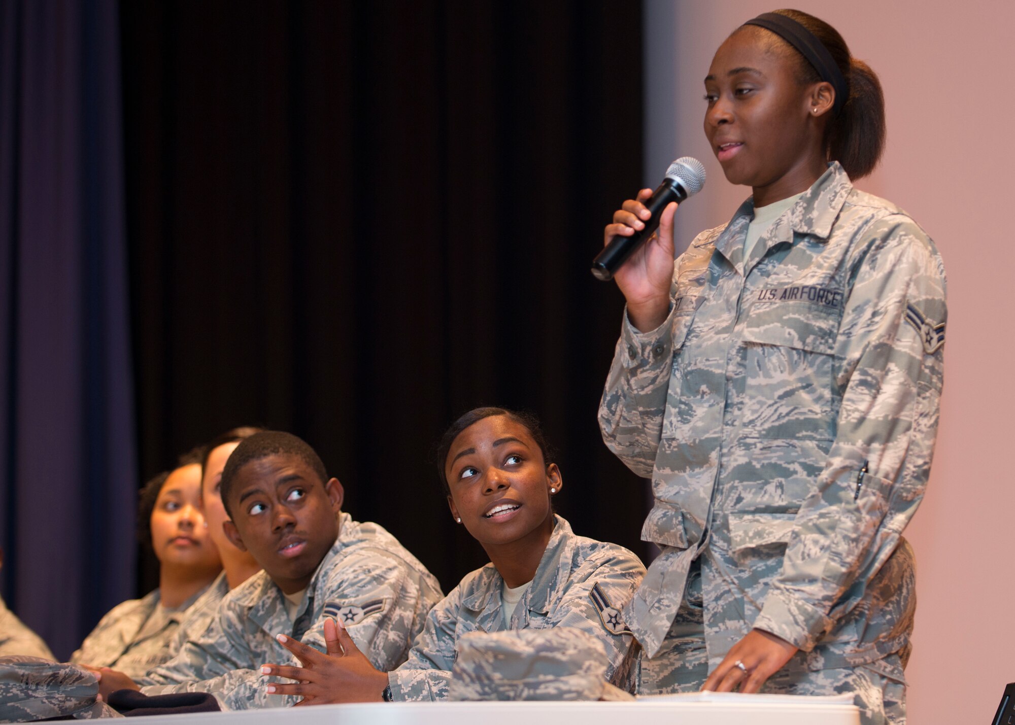 Members of the Airmen Committed to Excellence (ACE) organization answer questions from the audience during its first “Reverse-Mentoring” event at Langley Air Force Base, Va., Nov. 20, 2015. This was the first time that ACE has hosted a “Reverse-Mentoring” event. (U.S. Air Force photo by Staff Sgt. J.D. Strong II)