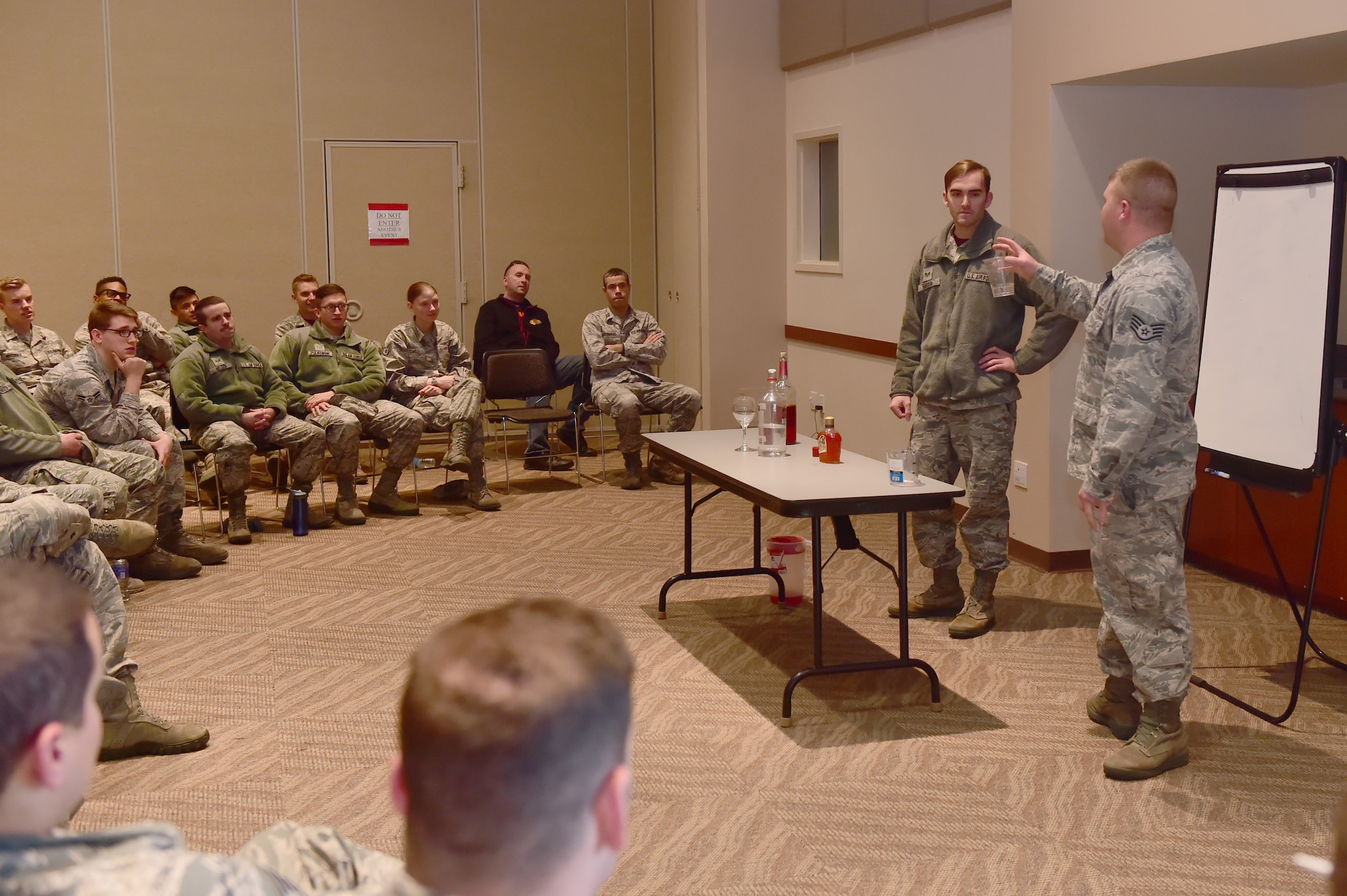 Staff Sgt. Jackson Josey, 460th Space Wing Medical Operations Squadron NCO in charge of alcohol drug abuse prevention and treatment, teaches a course called Fun with Alcohol to Airmen Nov. 20, 2015, on Buckley Air Force Base, Colo. Airmen took time during Wingman Day to attend classes that taught ways to handle different situations and stressors. (U.S. Air Force photo by Airman 1st Class Luke W. Nowakowski/Released)