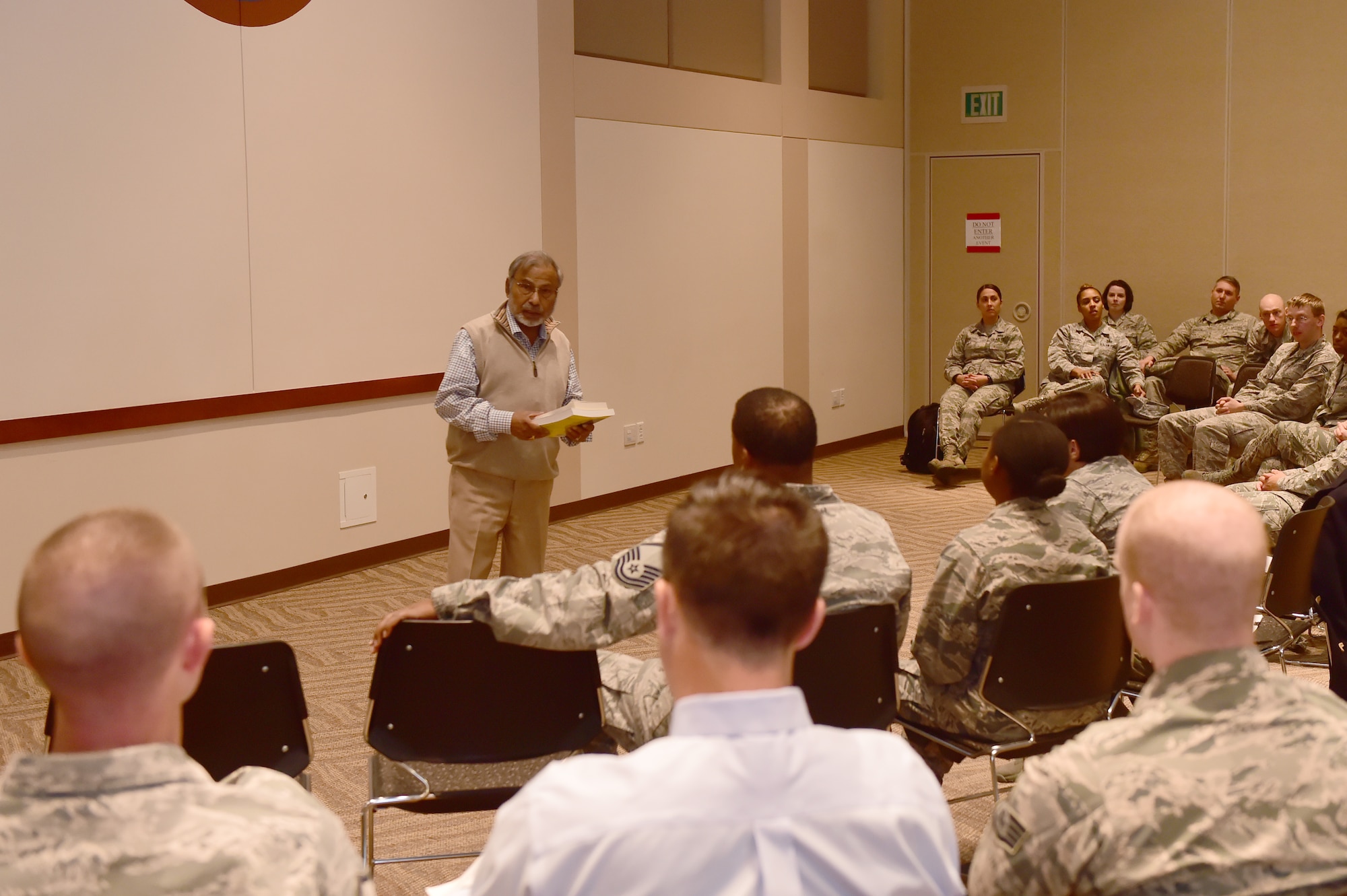 Anant Jain, 460th Space Wing Family Advocacy outreach manager, teaches a course on stress management Nov. 20, 2015, on Buckley Air Force Base, Colo. Airmen took time during Wingman Day to attend classes that taught ways to handle different situations that come up in everyday life. (U.S. Air Force photo by Airman 1st Class Luke W. Nowakowski/Released)