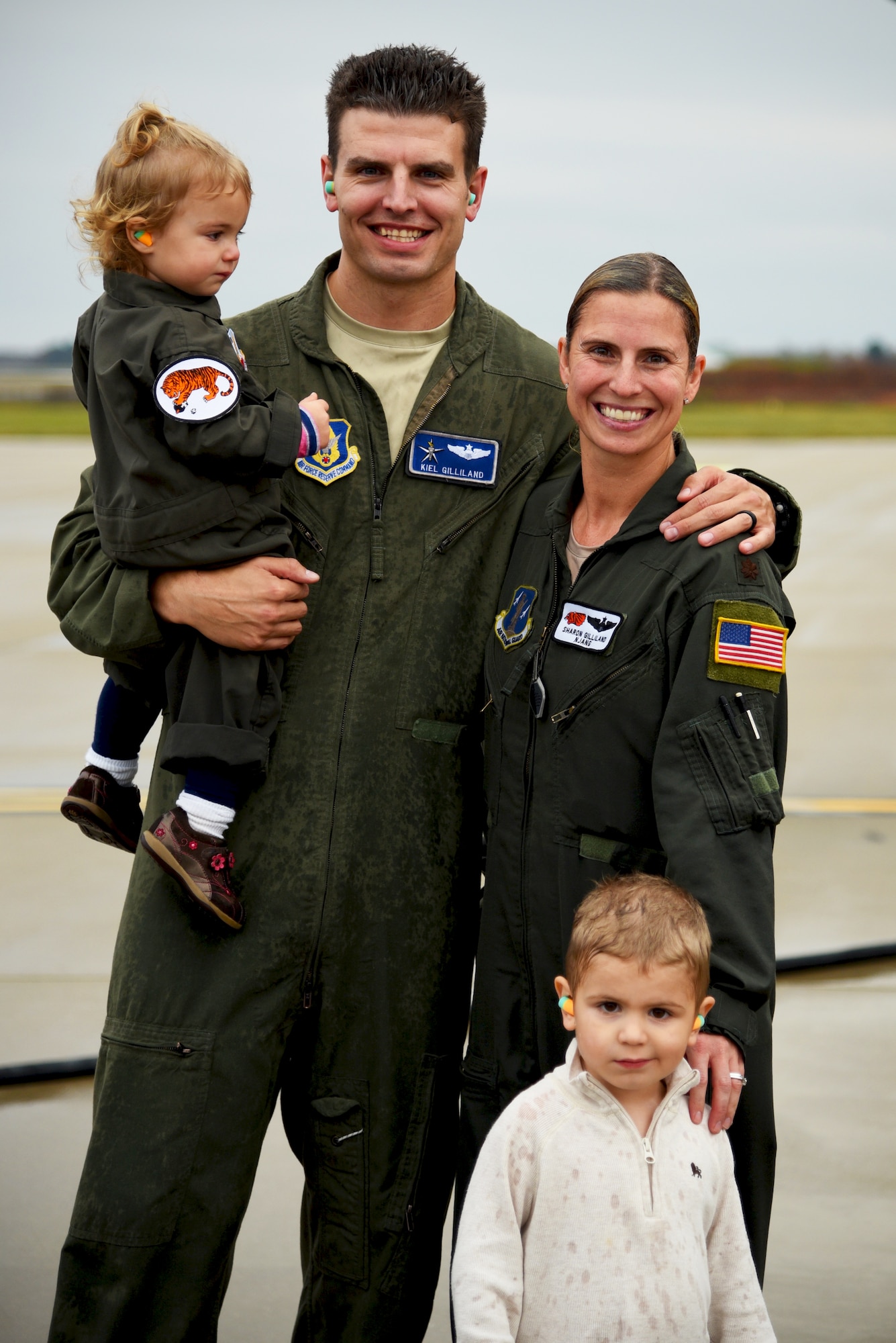 Maj. Sharon Gilliand, a KC-135 Stratotanker pilot with the 108th Wing, receives a celebratory spraying from her husband Maj. Kiel Gilliand, children Garrett and Lacey, fellow pilots and crew members following her final flight for the 108th Wing at Joint Base Mcguire-Dix-Lakehurst on Nov. 5, 2015. Gilliland, a pilot for 12 years with the New Jersey Air National Guard’s 108th Wing is ceremonially hosed down by fellow pilots, crewmembers, friends and family as she leaves piloting to others and takes a non-flying job with the 514th AMOS, Air Force Reserve so she can devote more time to her family. During her time in the 108th Wing, Gilliland deployed three times and has 60 combat sorties to her credit. (U.S. Air National Guard photo by Master Sgt. Carl Clegg/Released)