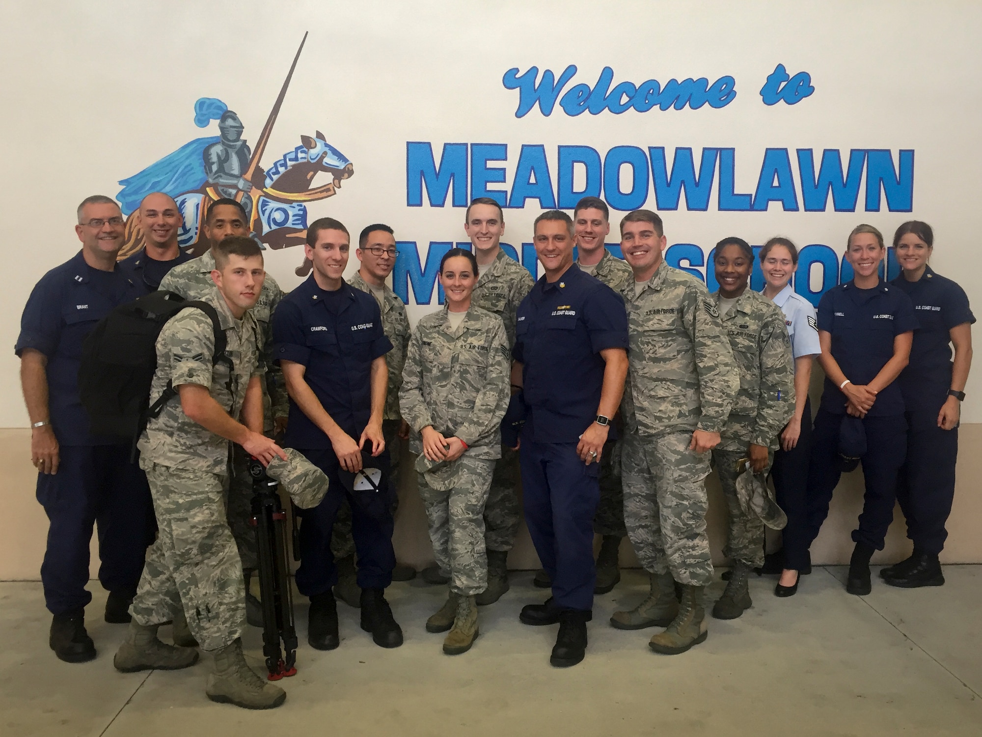 Volunteers with the 2nd Annual Great American Teach-In – Tour Across Pinellas pose for a photo at the end of the event at Meadowlawn Middle School in St. Petersburg, Fla., Nov. 18, 2015. Volunteers traveled to 16 schools, reaching 160 classrooms and spoke to more than 3,200 students answering questions and sharing their personal Air Force or Coast Guard stories. (Courtesy Photo)