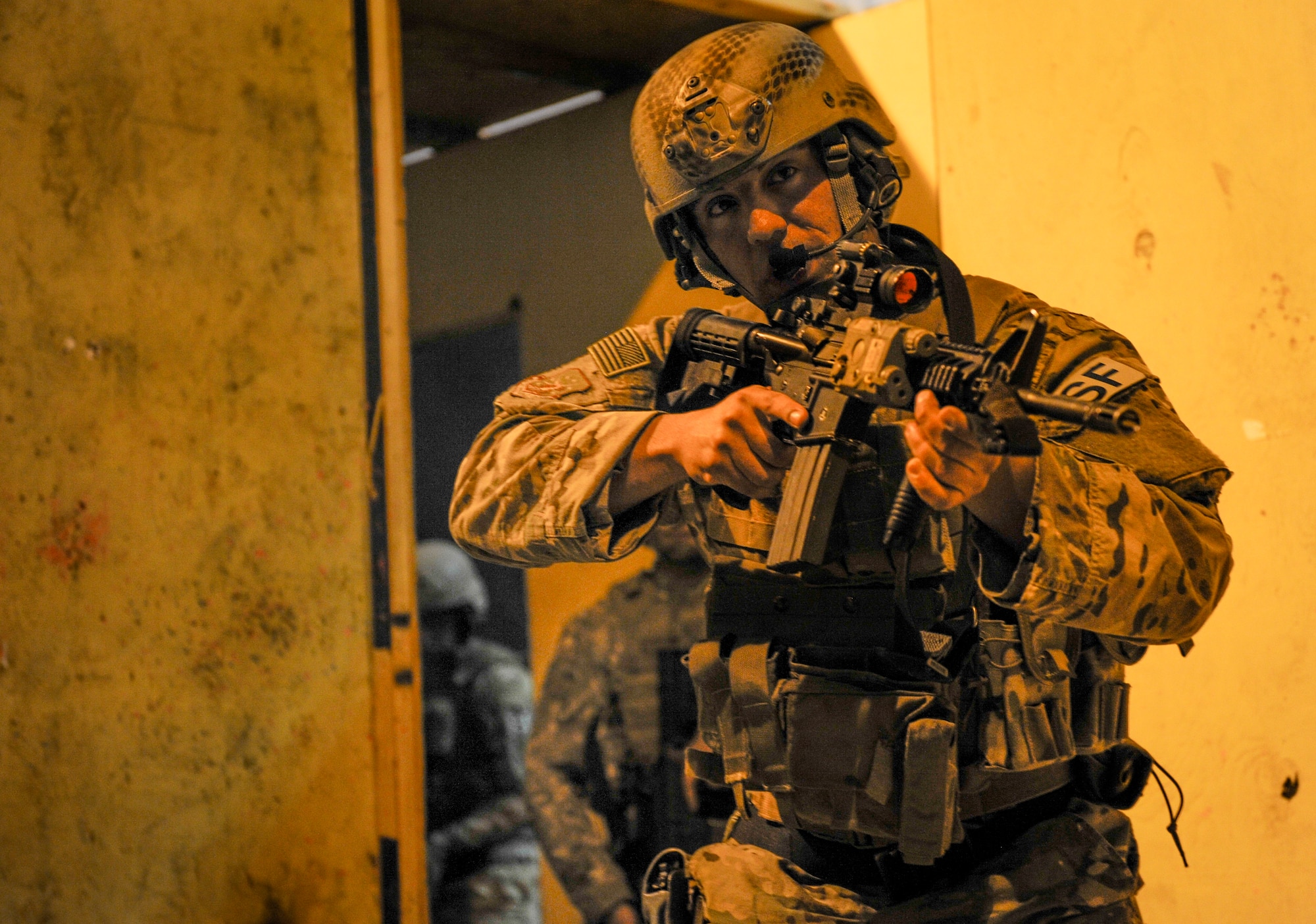 Senior Airman Miles Quintanar, 791st Missile Security Forces Squadron tactical response force member, clears a room at Minot Air Force Base, N.D., Oct. 14, 2015. TRF specializes in close quarters battle where the objective is to neutralize enemies, clear the building and secure any assets. (U.S. Air Force photo/Airman 1st Class Sahara L. Fales)