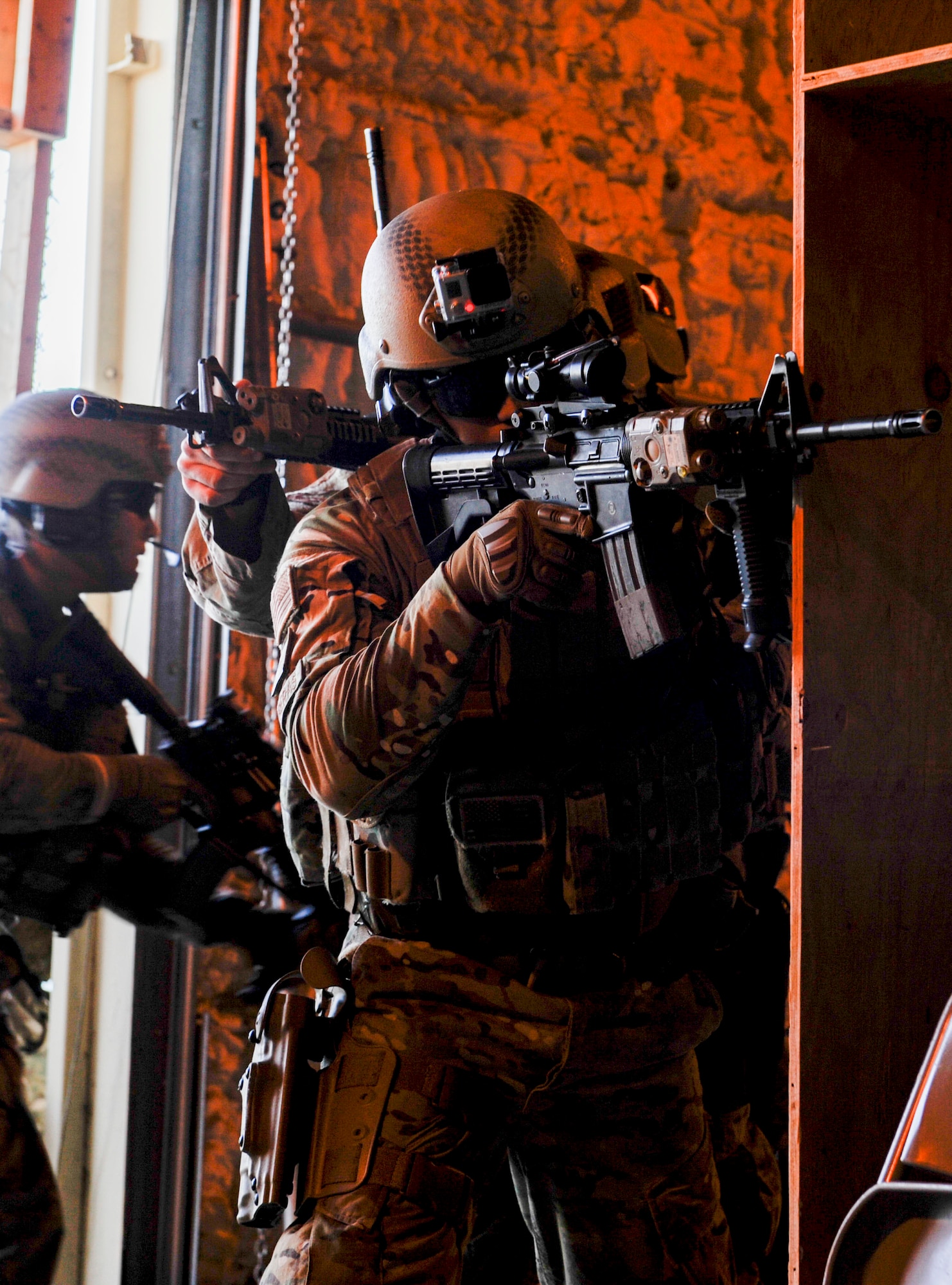 791st Missile Security Forces Squadron tactical response force members set up 360 degree security before entering the shoot house at Minot Air Force Base, N.D., Oct. 14, 2015. TRF specializes in close quarters battle where the objective is to neutralize enemies, clear the building and secure any assets. (U.S. Air Force photo/Airman 1st Class Sahara L. Fales)