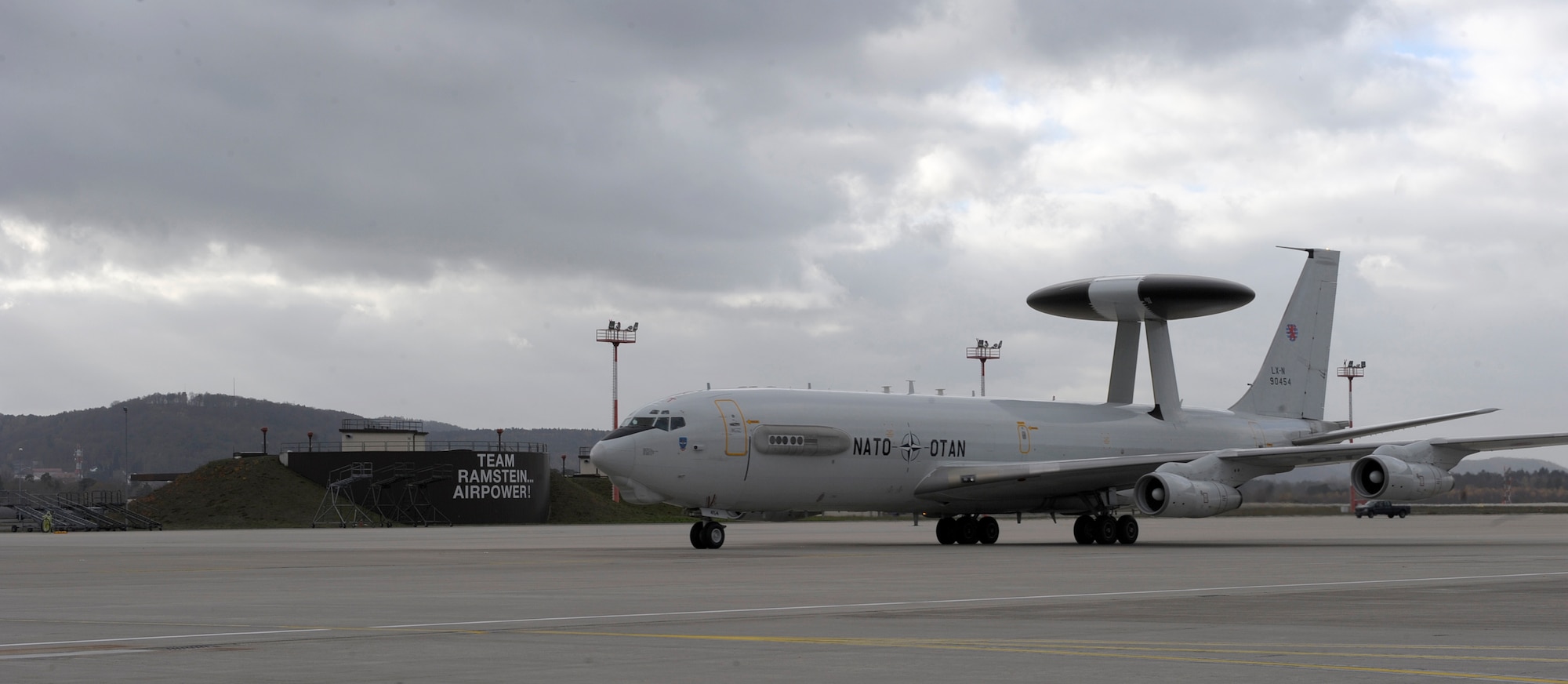 An E-3 Sentry airborne warning and control system (AWACS) aircraft assigned to the E-3A Component at NATO Air Base Geilenkirchen, Germany taxis on to the flightline Nov. 18, 2015, at Ramstein Air Base, Germany. The NATO AWACS visited Ramstein in order to familiarize NATO Allied Air Command (AIRCOM) leadership with its capabilities as the E-3A Component is scheduled to come under operational command of AIRCOM in fall 2016. (U.S. Air Force photo/Staff Sgt. Timothy Moore)