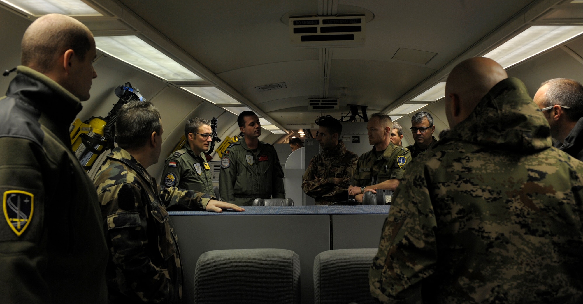 Members of NATO Allied Air Command (AIRCOM) tour an E-3 Sentry airborne warning and control system (AWACS) Nov. 18, 2015, at Ramstein Air Base, Germany. The AWACS is assigned to the E-3A Component at NATO Air Base Geilenkirchen, Germany. The E-3A Component is scheduled to fall under AIRCOM operational control in fall 2016. (U.S. Air Force photo/Staff Sgt. Timothy Moore)