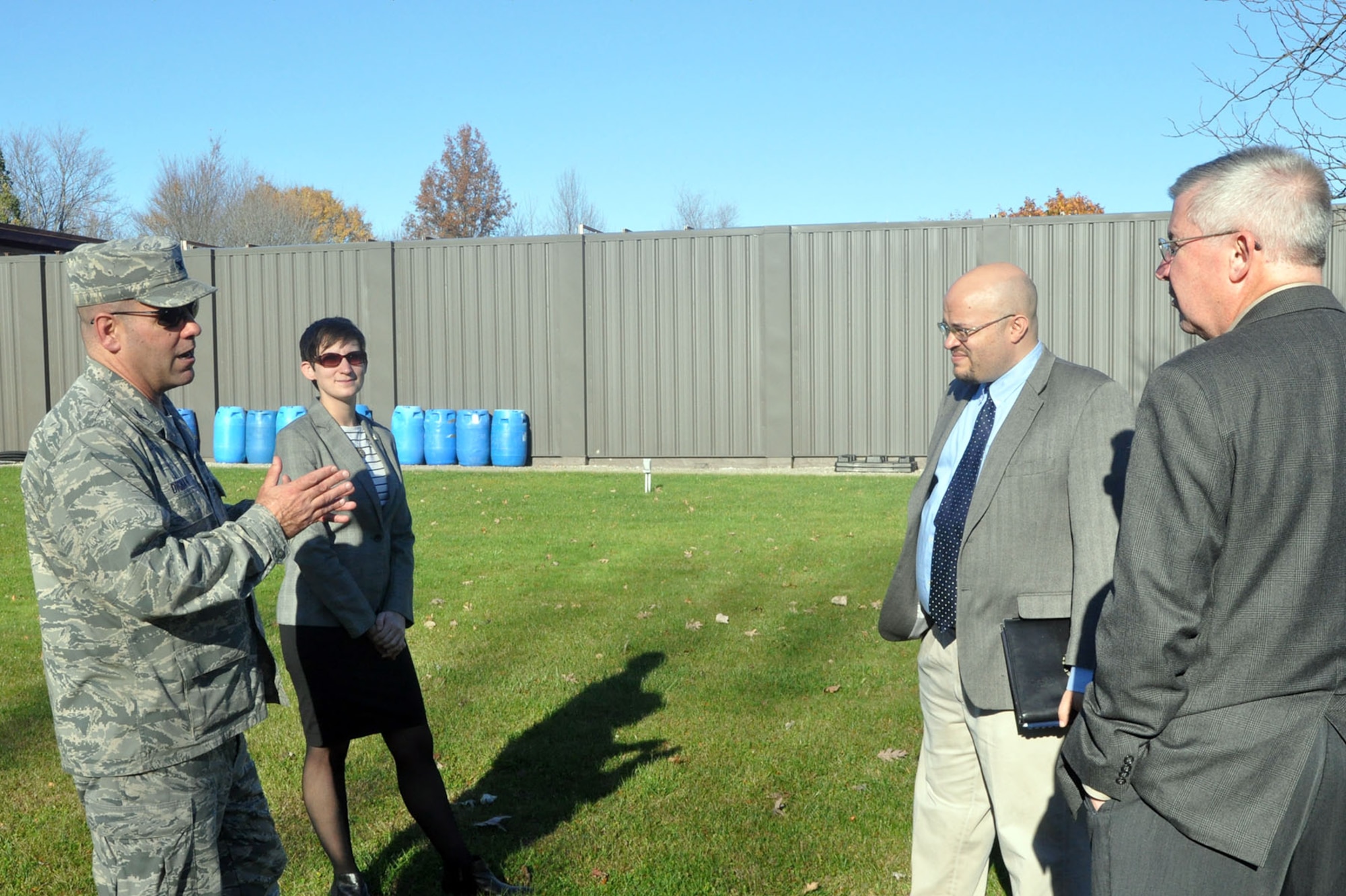 Col. James Dignan (far left), commander of the 910th Airlift Wing, talks to staffers from the office of Ohio U.S. Senator Sherrod Brown at the site of a proposed $9.4 million state-of-the-art firing range during a visit here, Nov. 3, 2015. The staffers for the Buckeye state’s senior senator are Sarah Lowry (second from left), Northeast Ohio Regional Representative; Kenneth Williamson (second from right), Constituent Advocate; and John Ryan (right), State Director; were at YARS for a tour of the installation. The funds for the new facility are included in the 2016 National Defense Authorization Act which was recently passed by the U.S. Congress and is currently awaiting President Obama’s approval. (U.S. Air Force photo/Master Sgt. Bob Barko Jr.)
