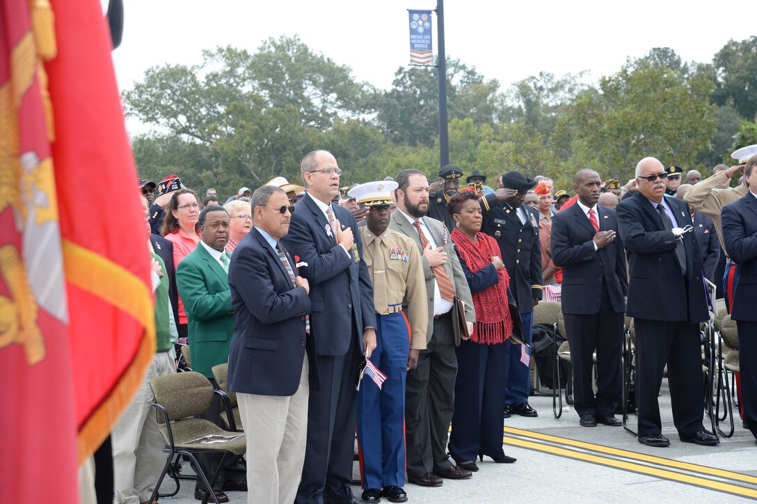 Col. James C. Carroll III, commanding officer, Marine Corps Logistics Base Albany, joins other local dignitaries, hundreds of veterans and community members for the dedication ceremony for the Broad Avenue Veterans Memorial Bridge, Nov. 11. “Thank you for your strong support of the military, he said. “MCLB Albany has been an integral part of this community and Southwest Georgia and the bond we share is just as strong today as it was in 1952. Many of the veterans here today have come through MCLB Albany and have remained here as retirees and employees. In my almost 30 years in the Marine Corps, I have traveled across this great nation and I have never run across a community that has a stronger bond with retirees as well as active duty that exists here in Albany, Georgia.”