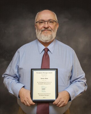 Terry Zien, St. Paul District hydraulic engineer, received the annual Floodplain Manager Award for distinguished service in floodplain management at the Minnesota Association of Floodplain Managers, or MnAFPM, conference in Moorhead, Minnesota, Nov. 19.