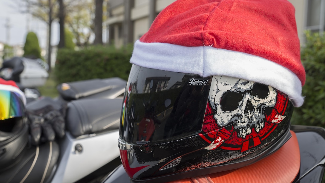Motorcyclists from Marine Corps Air Station Iwakuni, Japan, and the local Japanese community rode onto MCAS Iwakuni for the third-annual Toy Drive and Motorcycle Rally, Nov. 22, 2015. Riders decked-out their bikes in holiday decorations and donated toys at the Marine Thrift Store for Japanese orphans. The event concluded with a Thunder Ride around the air station. (U.S. Marine Corps photo by Cpl. Nicole Zurbrugg/Released)