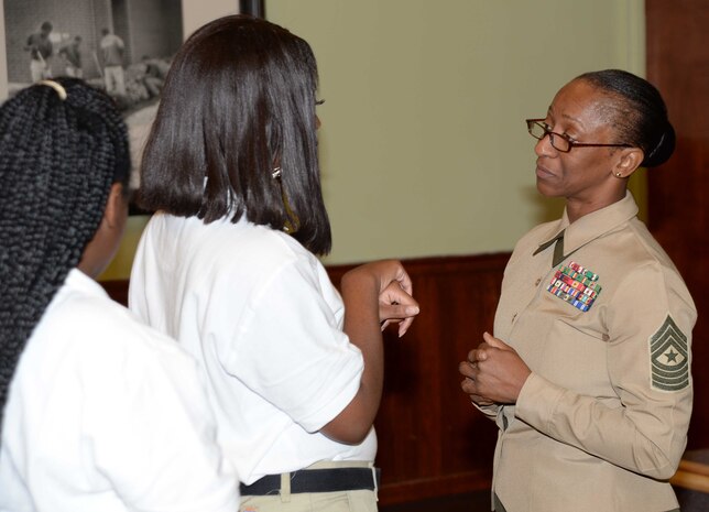 Sgt. Maj. Stephanie Murphy, sergeant major, Marine Corps Logistics Command, speaks during the annual Veterans Appreciation Luncheon at Turner Job Corps, Nov. 13. Murphy thanked the veterans in attendance for their service and encouraged them to continue to cultivate their deep love of country and service. “But to the students gathered here, I urge you to challenge yourselves to complete the task of graduating from your respective programs, be humble, be genuine, be a leader, focus on your daily efforts and finish what you start,” she said. “This is how you honor veterans.”