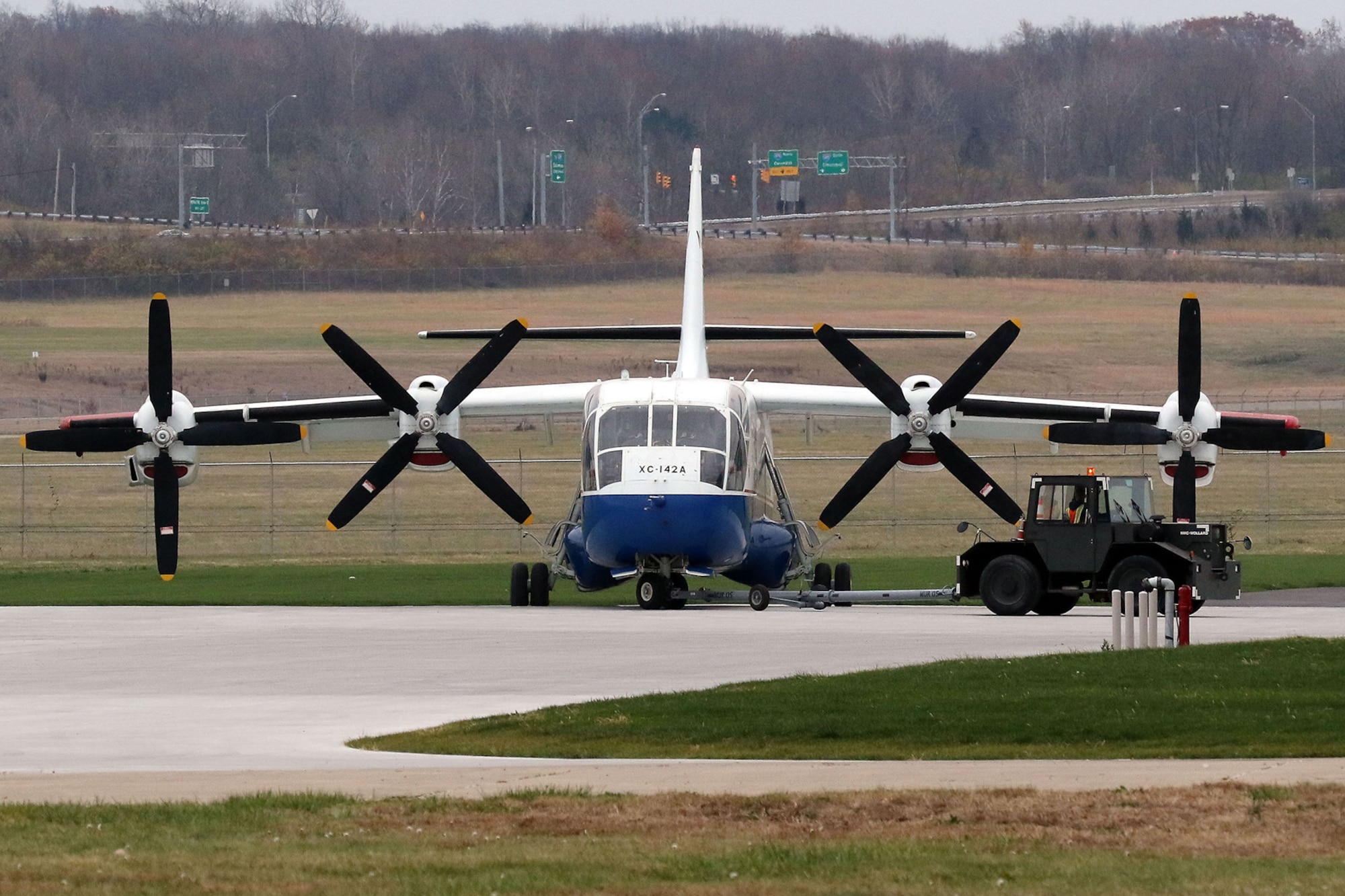Restoration staff move the Chance-Vought/LTV XC-142A into the new fourth building at the National Museum of the U.S. Air Force on Nov. 22, 2015. (U.S. Air Force photo by Don Popp)