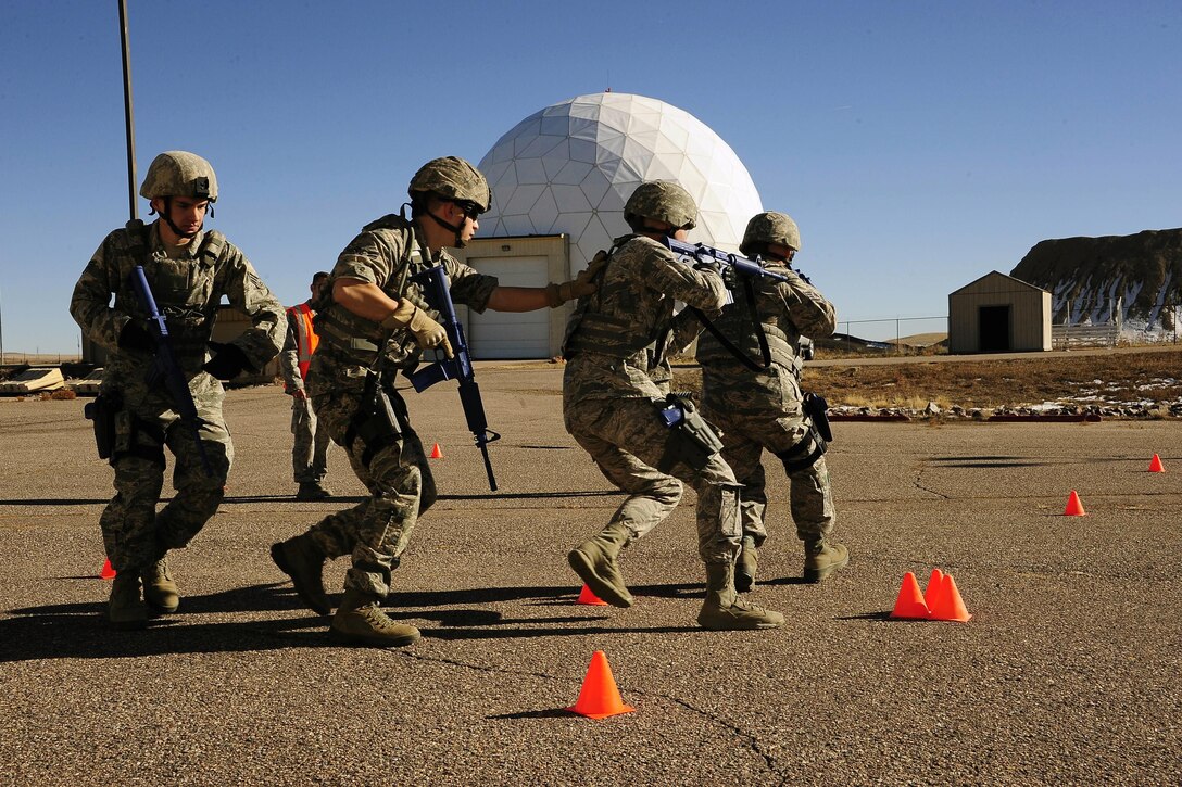 Colorado Air National Guardsmen conduct training in real-world scenarios on Buckley Air Force Base, Colo., Nov. 15, 2015. The airmen are assigned to the 140th Security Forces Squadron. Colorado National Guard photo by Air Force Tech. Sgt. Nicole Manzanares