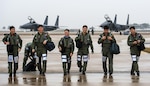 KUNSAN AIR BASE, Republic of Korea (Nov. 17, 2015) - F-15K Slam Eagle pilots from the Republic of Korea (ROK) air force 11th Fighter Wing, Daegu, share a laugh during Buddy Wing 15-7. During the five-day exercise, pilots from the 8th Fighter Wing exchanged tactics and procedures with their ROKAF counterparts. 
