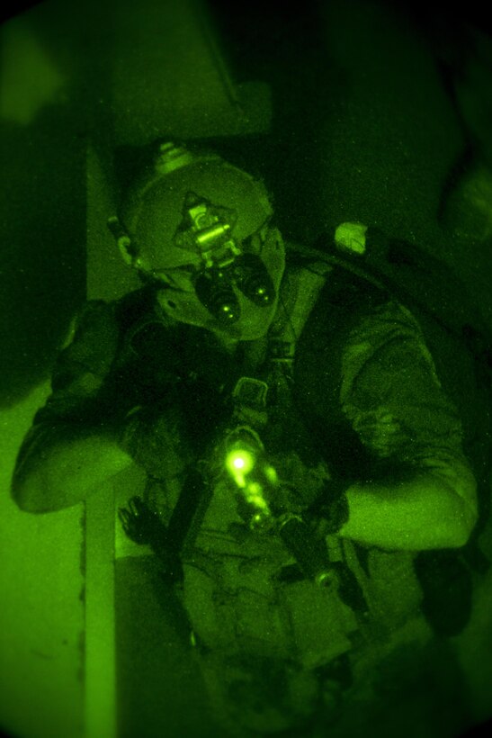 A Marine Raider with Marine Special Operations Company Charlie, 1st Marine Raider Battalion, U.S. Marine Corps Forces, Special Operations Command, provides security for his teammates participating in Visit, Board, Search and Seizure training, during their Company Collective Exercise, Oct. 15, 2015, in San Diego, Calif.