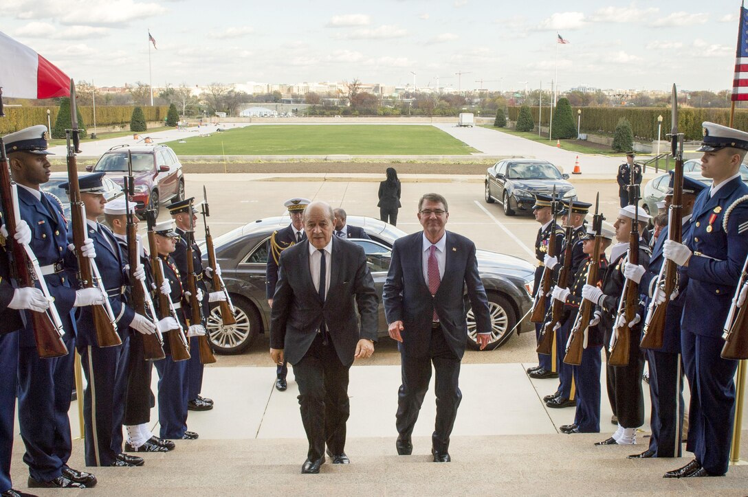 U.S. Defense Secretary Ash Carter hosts an honor cordon welcoming French Defense Minister Jean-Yves Le Drian to the Pentagon, Nov. 24, 2015. The two leaders met to discuss matters of mutual interest. DoD photo by Air Force Senior Master Sgt. Adrian Cadiz
