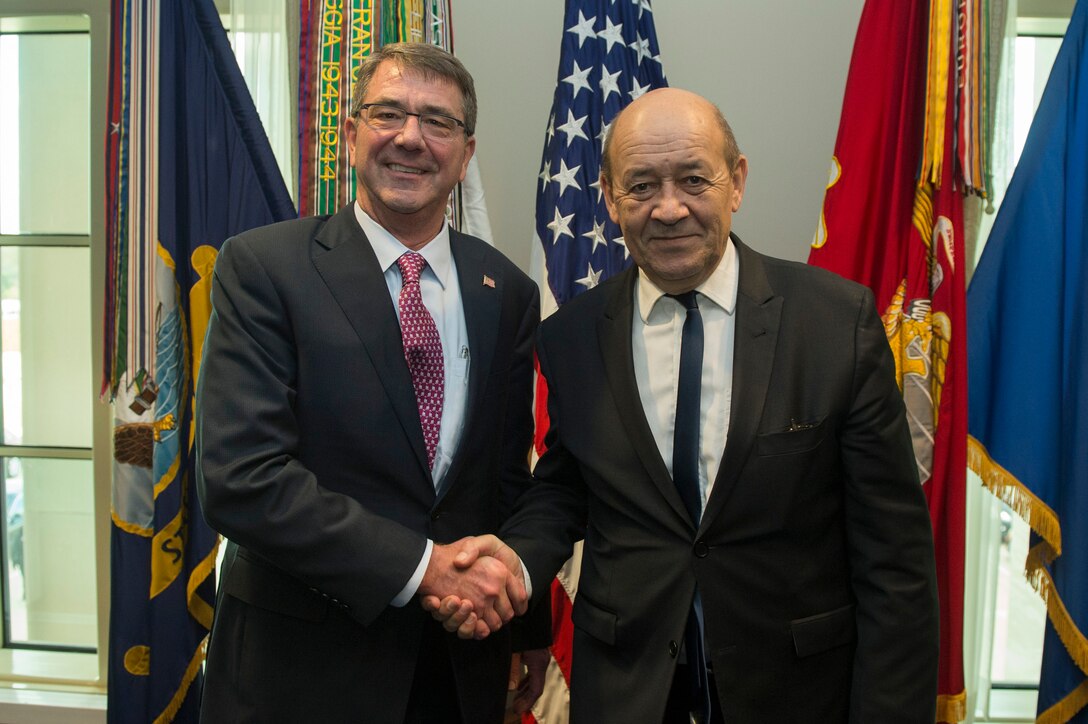U.S. Defense Secretary Ash Carter poses for a photo with French Defense Minister Jean-Yves Le Drian at the Pentagon, Nov. 24, 2015. DoD photo by Air Force Senior Master Sgt. Adrian Cadiz