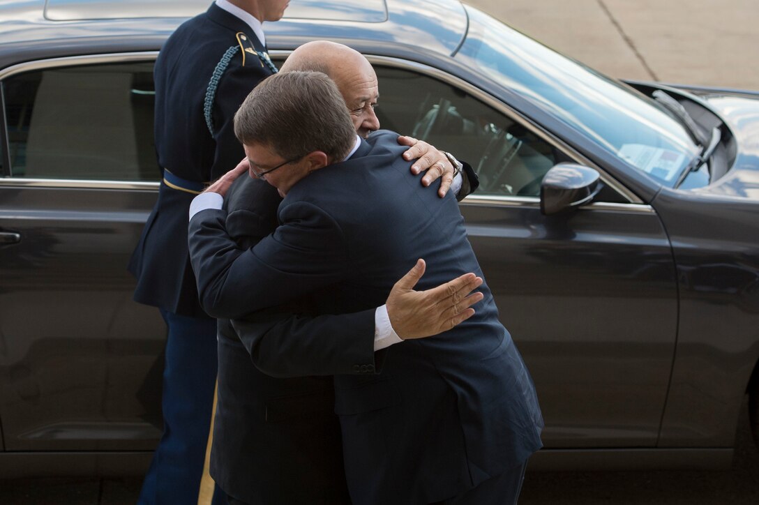 U.S. Defense Secretary Ash Carter embraces French Defense Minister Jean-Yves Le Drian upon welcoming him to the Pentagon, Nov. 24, 2015. DoD photo by Air Force Senior Master Sgt. Adrian Cadiz