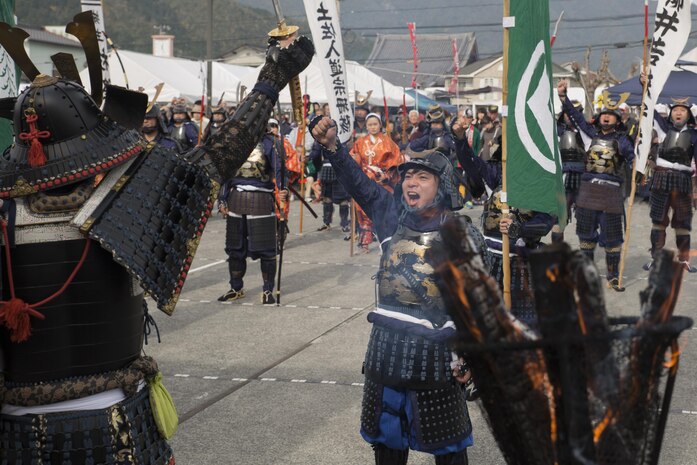 Participants give one last war cry before marching off at the Kuragake Castle Festival in Kuga, Iwakuni, Japan, Nov. 22, 2015. The festival honors the local Kuga samurai who urged their castle lord to take a last stand against a much larger enemy force. According to event coordinators, U.S. participants in the 26th annual Kuragake Castle Festival boosted the spirit of the festival and made the stage performance one of their most highlighted events.