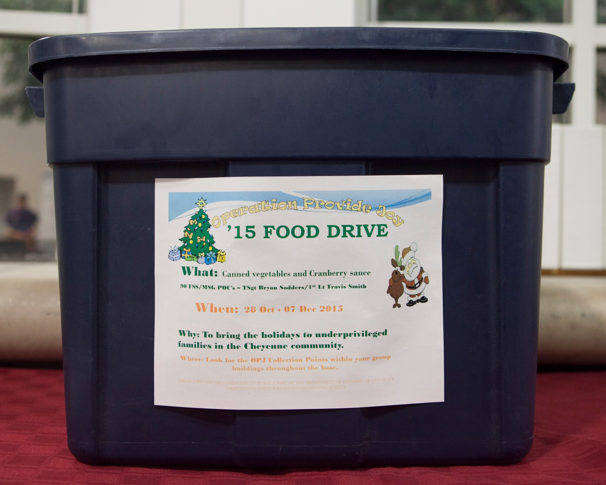 Bins used for collecting canned goods are placed at various locations throughout F.E. Warren Air Force Base for the base's annual 2015 Operation Provide Joy event. The food collected will be used to provide underprivileged families with a holiday dinner. (U.S. Air Force photo by Lan Kim)