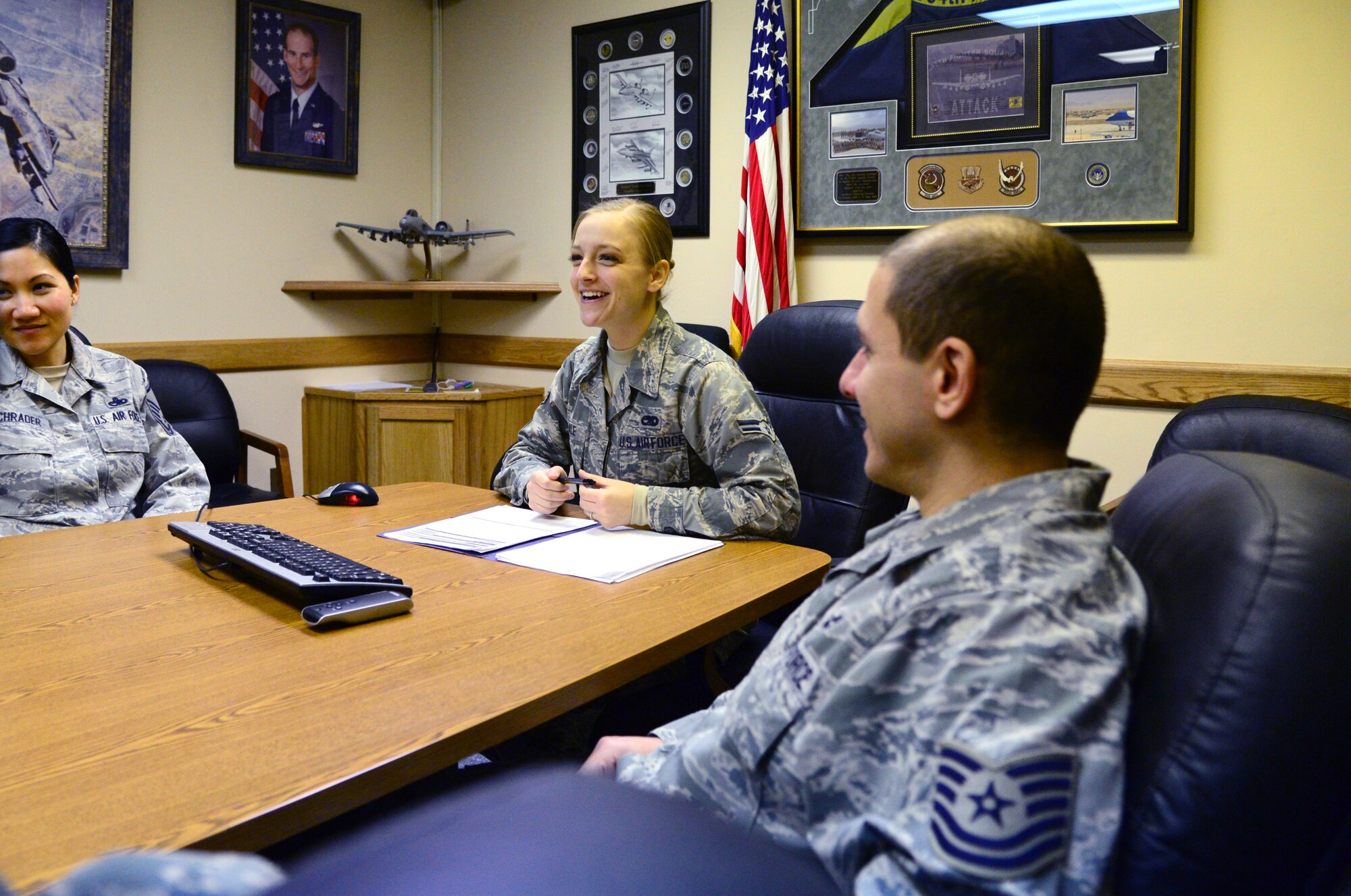 U.S. Air Force Airman 1st Class Summer Seale, a 354th Maintenance Group wing plans, scheduling and documentation apprentice, holds a meeting Nov. 23, 2015, at Eielson Air Force Base, Alaska. Seale chairs meetings that decide what maintenance will be accomplished during aircraft downtime. (U.S. Air Force photo by Airman 1st Class Cassandra Whitman/Released)